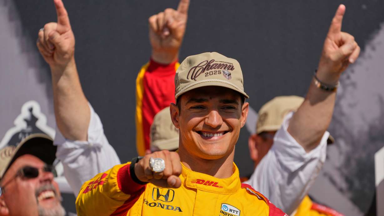 FILE - Alex Palou celebrates after winning the IndyCar championship Sunday, Aug. 31, 2025, at Nashville Superspeedway in Lebanon, Tenn.