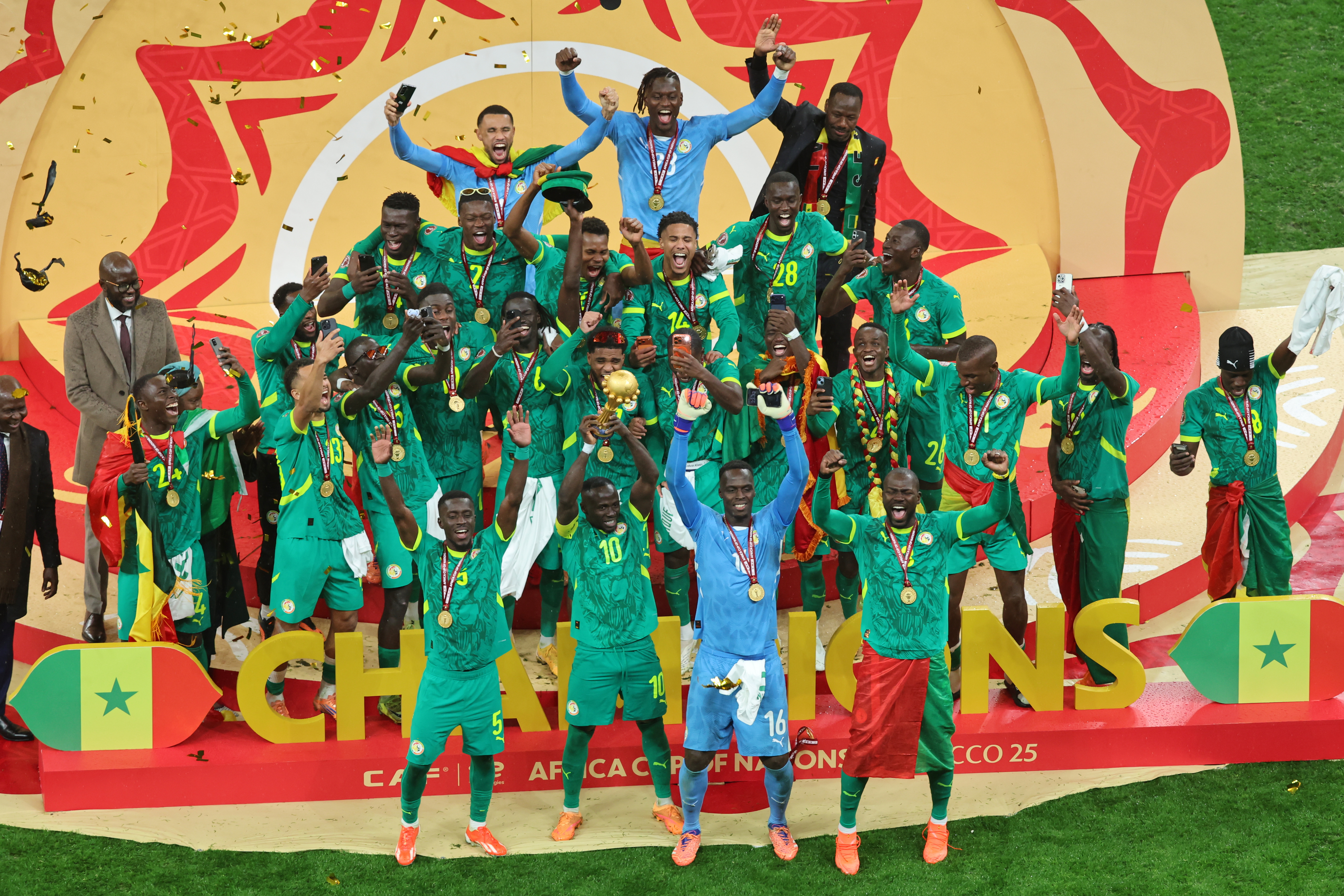 Senegal's Sadio Mane holds the trophy aloft as he celebrates with teammates after winning the Africa Cup of Nations final soccer match between Senegal and Morocco in Rabat, Morocco, Sunday, Jan. 18, 2026. 