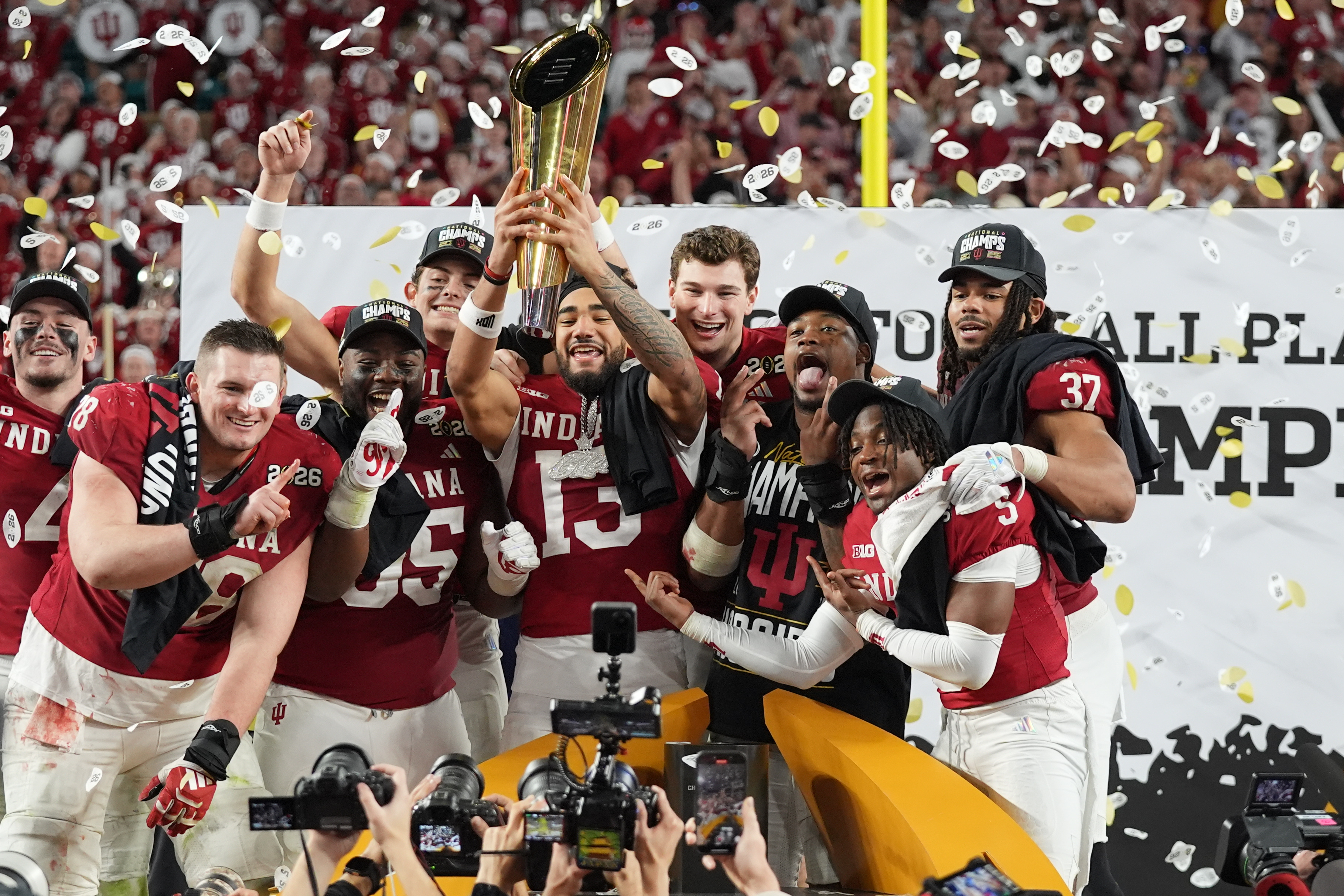 Indiana holds the trophy after their win against Miami in the College Football Playoff national championship game, Monday, Jan. 19, 2026, in Miami Gardens, Fla. 