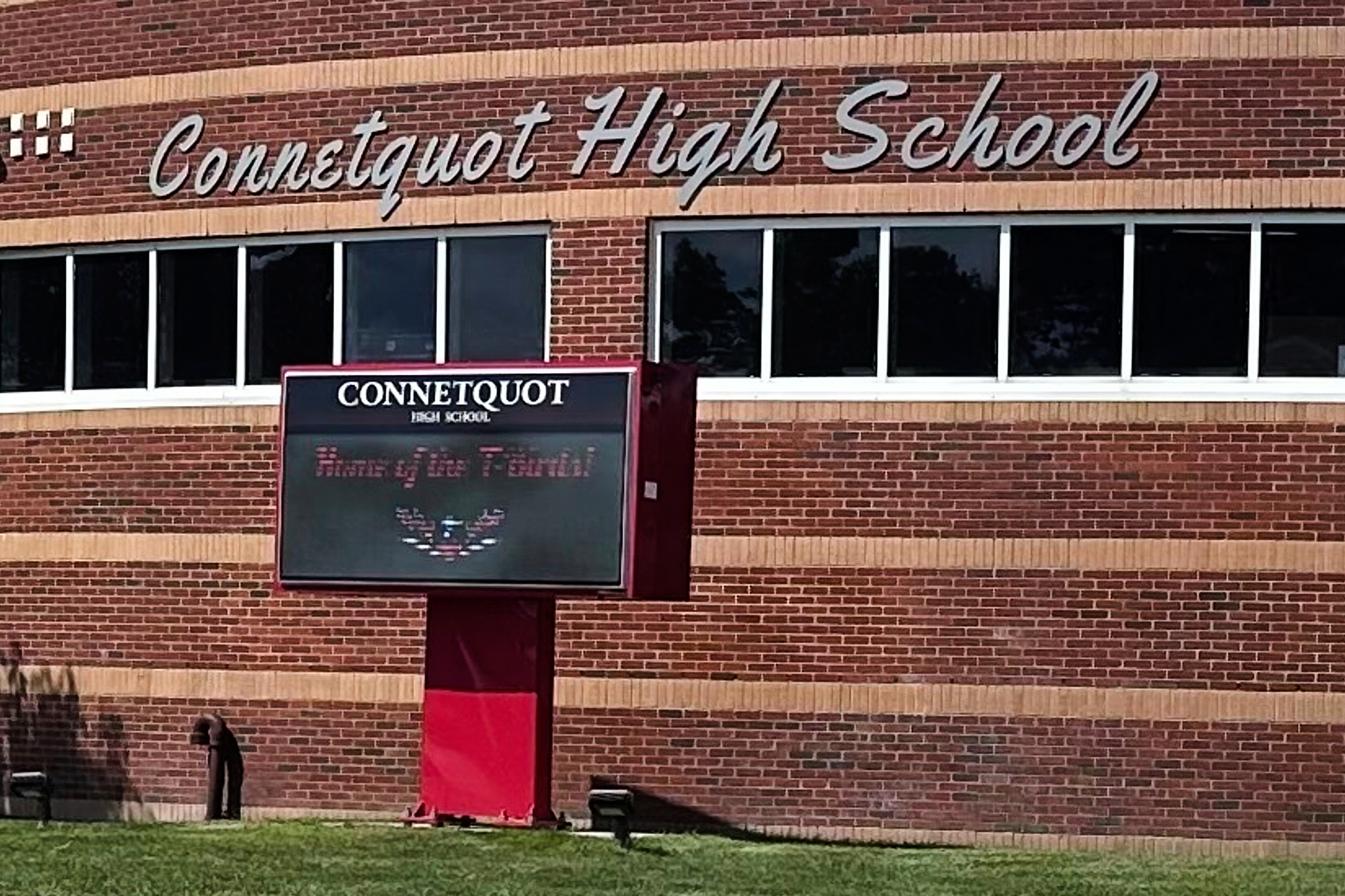 FILE - An electronic display shows the new mascot name, T-Birds, outside Connetquot High School in Bohemia, N.Y., Sept. 4, 2025. 