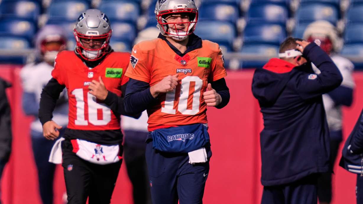 New England Patriots quarterback Drake Maye (10) runs with teammates during a football availability, Friday, Jan. 23, 2026, in Foxborough, Mass.