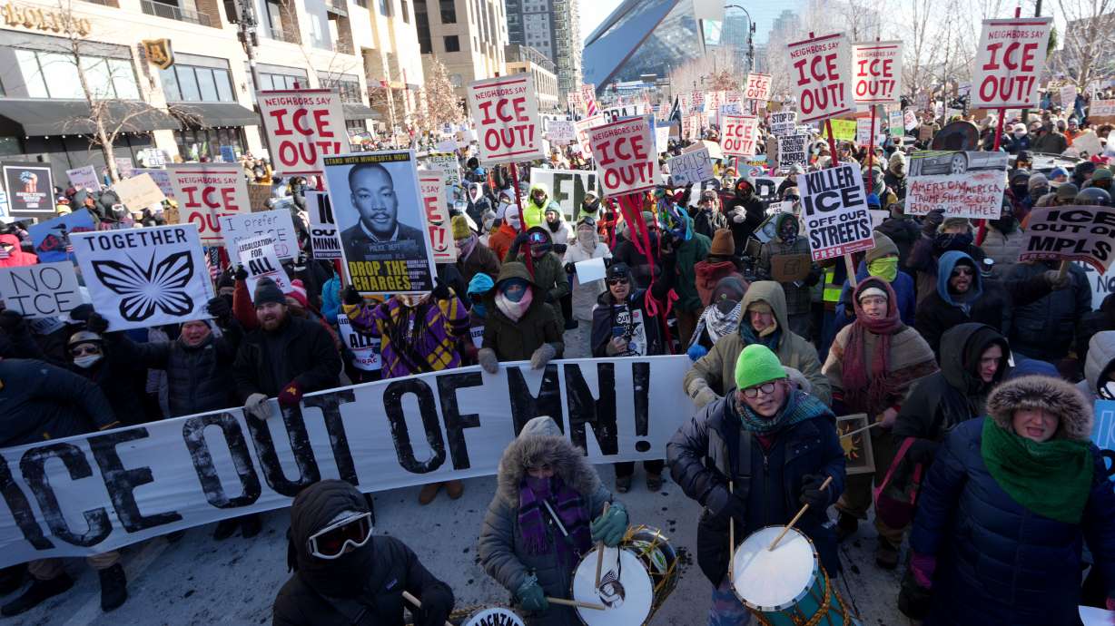People protest against Federal immigration agents on Friday, in Minneapolis. The protests are part of a broader movement against an increased immigration enforcement statewide by the Trump administration.