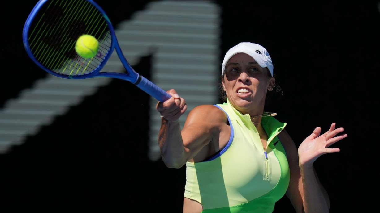 Madison Keys of the U.S. plays a forehand return to Karolina Pliskova of the Czech Republic during their third round match at the Australian Open tennis championship in Melbourne, Australia, Saturday, Jan. 24, 2026.
