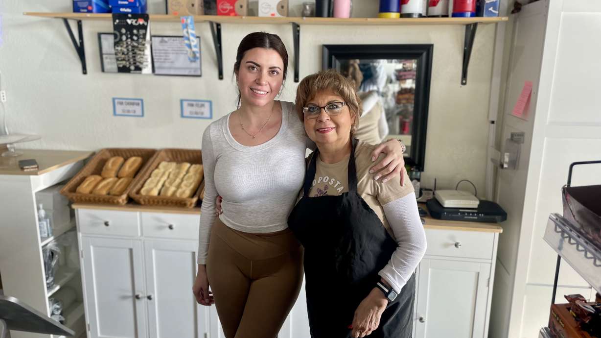 Mother-daughter duo Yamila Hernandez and Leticia Silva pose for a photo at La Brioche Argentine Bakery on Friday. The family-owned Orem business will close Feb. 1 due to financial hurdles that have made sustaining the bakery too challenging.