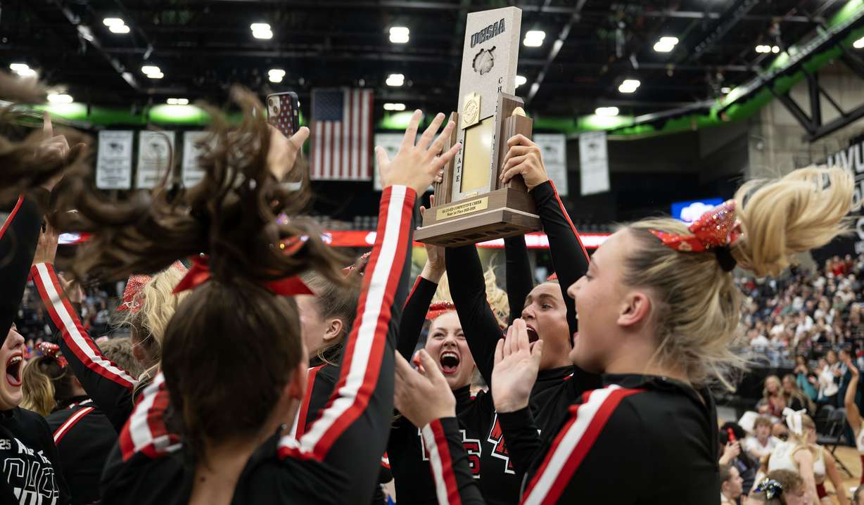 Weber cheerleaders celebrate their 6A coed championship at UVU in Orem on Friday, Jan. 23, 2026.