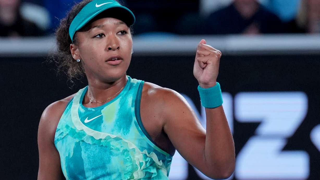 Naomi Osaka of Japan reacts after defeating Sorana Cirstea of Romania in their second round match at the Australian Open tennis championship in Melbourne, Australia, Thursday, Jan. 22, 2026.