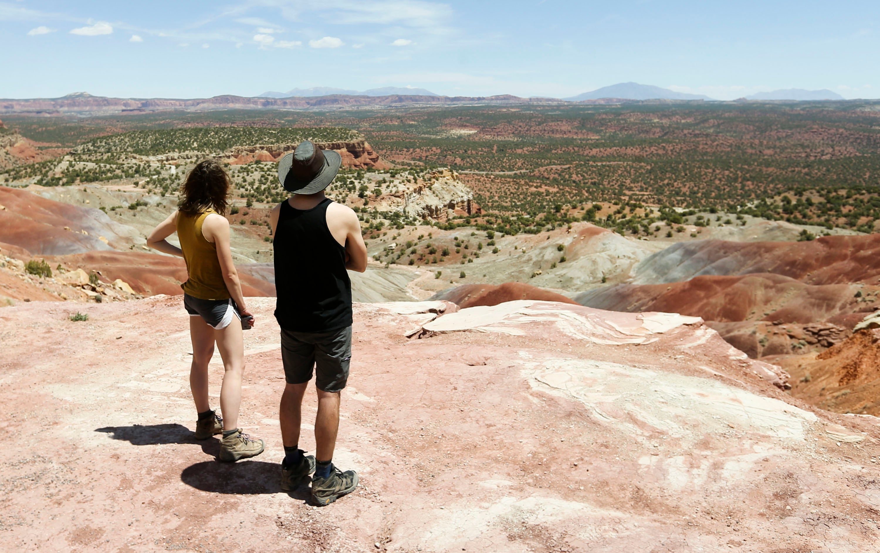Tourists look at the Grand Staircase-Escalante National Monument on May 14, 2021.