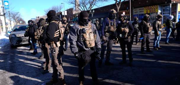 Police chief calls for calm after a man is shot and killed during Minneapolis immigration crackdown