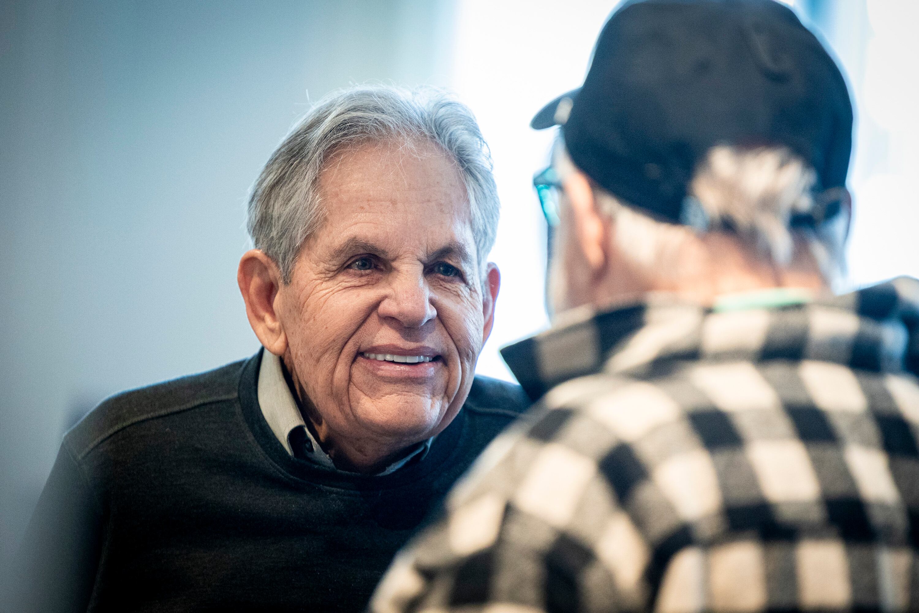 Rob Kallas, outgoing general manager for University Place, talks with Jeffrey K. Woodbury, senior vice president of development and acquisitions for Woodbury Corporation, during a retirement party for Kallas, held at the Courtyard by Marriott Orem University Place hotel on Jan. 15.