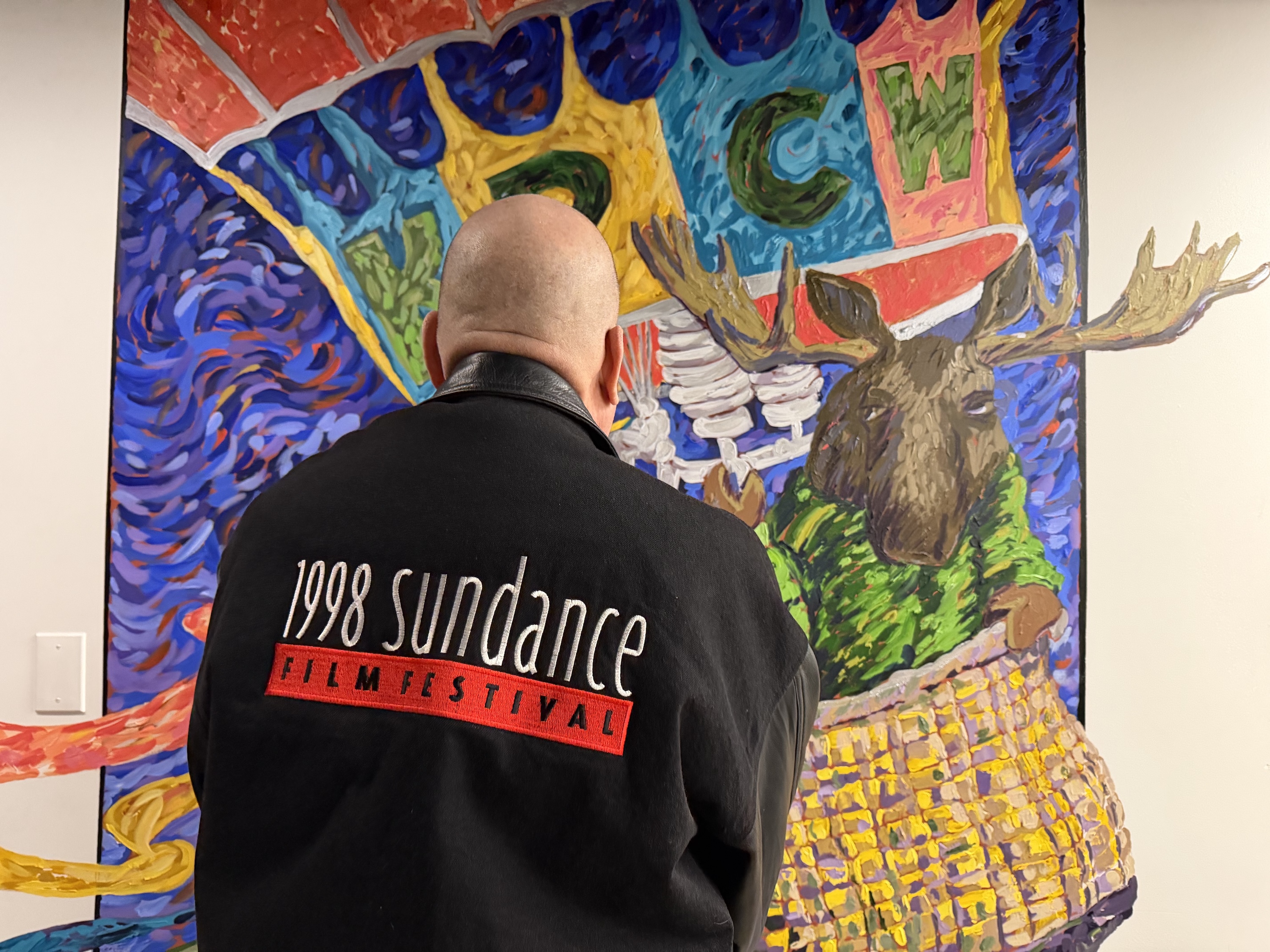 Pleasant Grove resident Mike Wisland shows off his oldest merch from the Sundance Film Festival in 1998. Wisland has attended the festival every year since 1995.