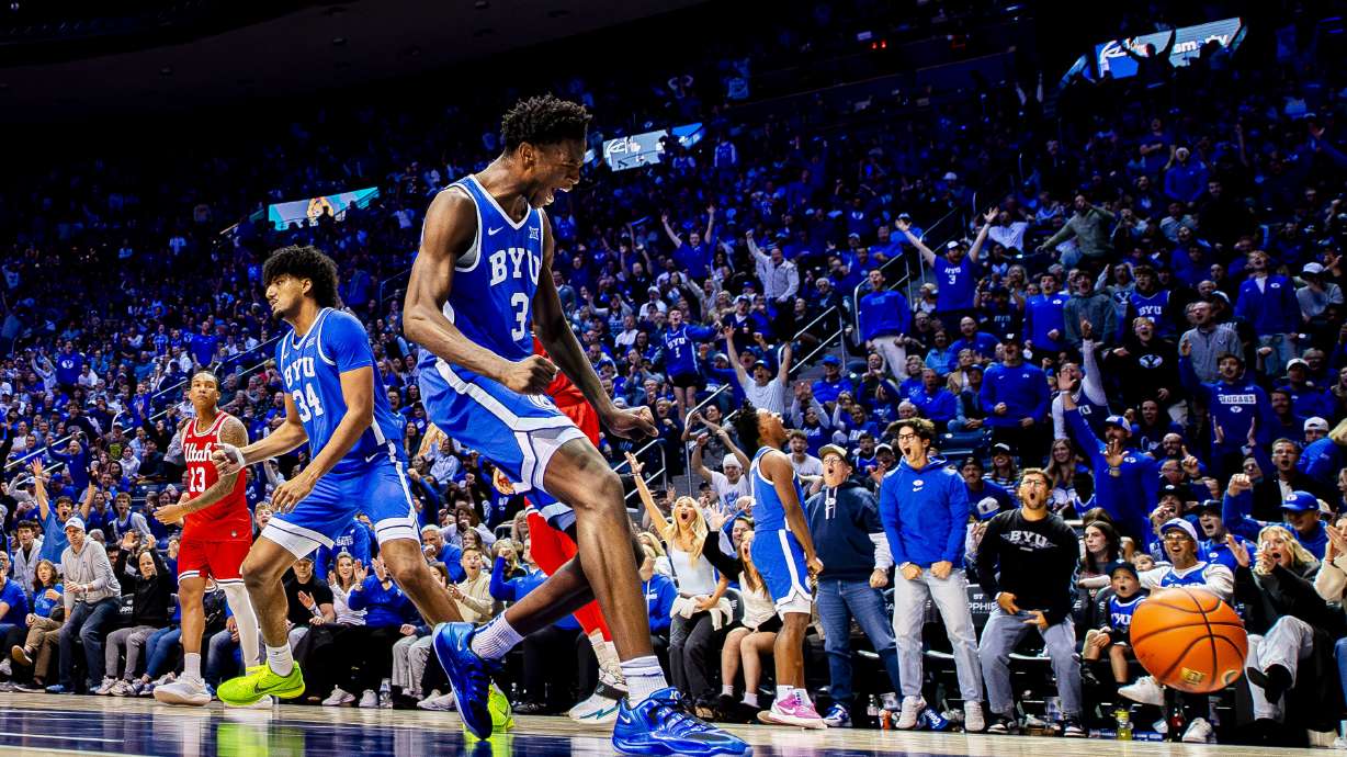 BYU forward AJ Dybantsa (3) celebrates after dunking the ball during an NCAA basketball game against Utah held at the Marriott Center in Provo on Saturday, Jan. 24, 2026.