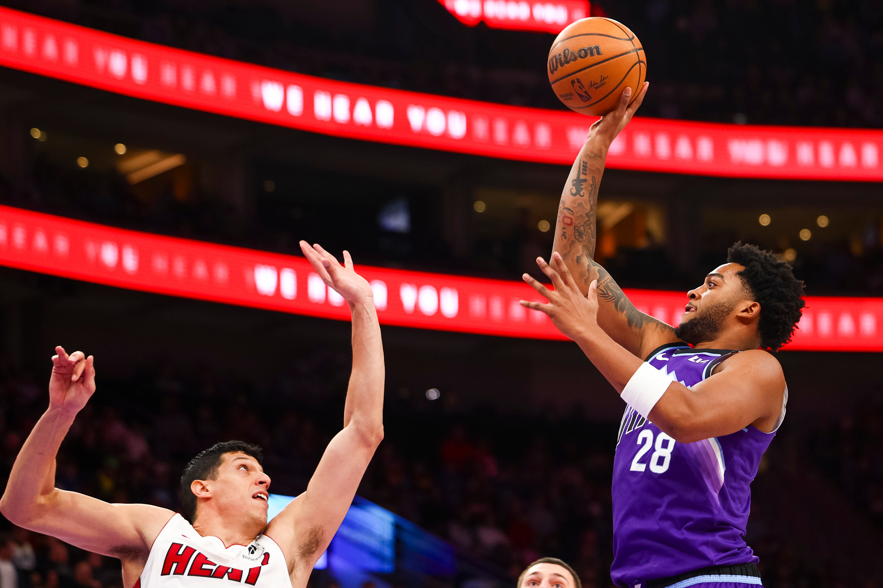 Sensabaugh's clutch 3 lifts Jazz over Heat 115-111