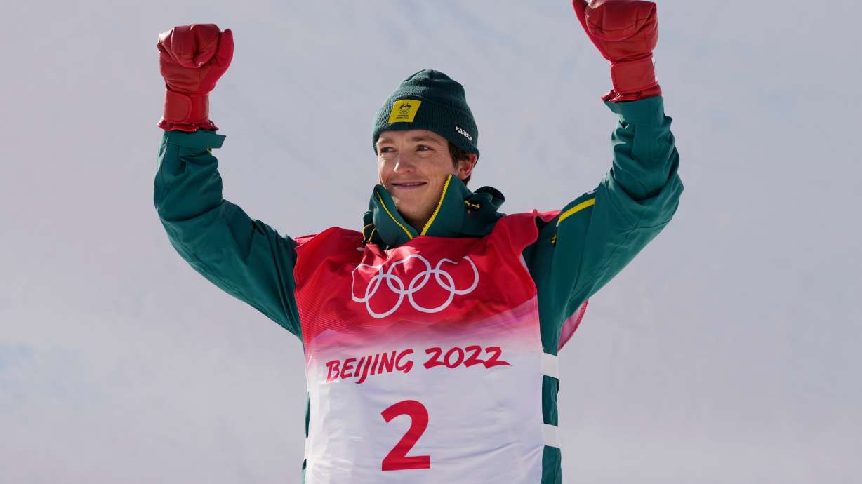 FILE - Silver medal winner Australia's Scotty James celebrates during the venue award ceremony for the men's halfpipe finals at the 2022 Winter Olympics, Feb. 11, 2022, in Zhangjiakou, China.