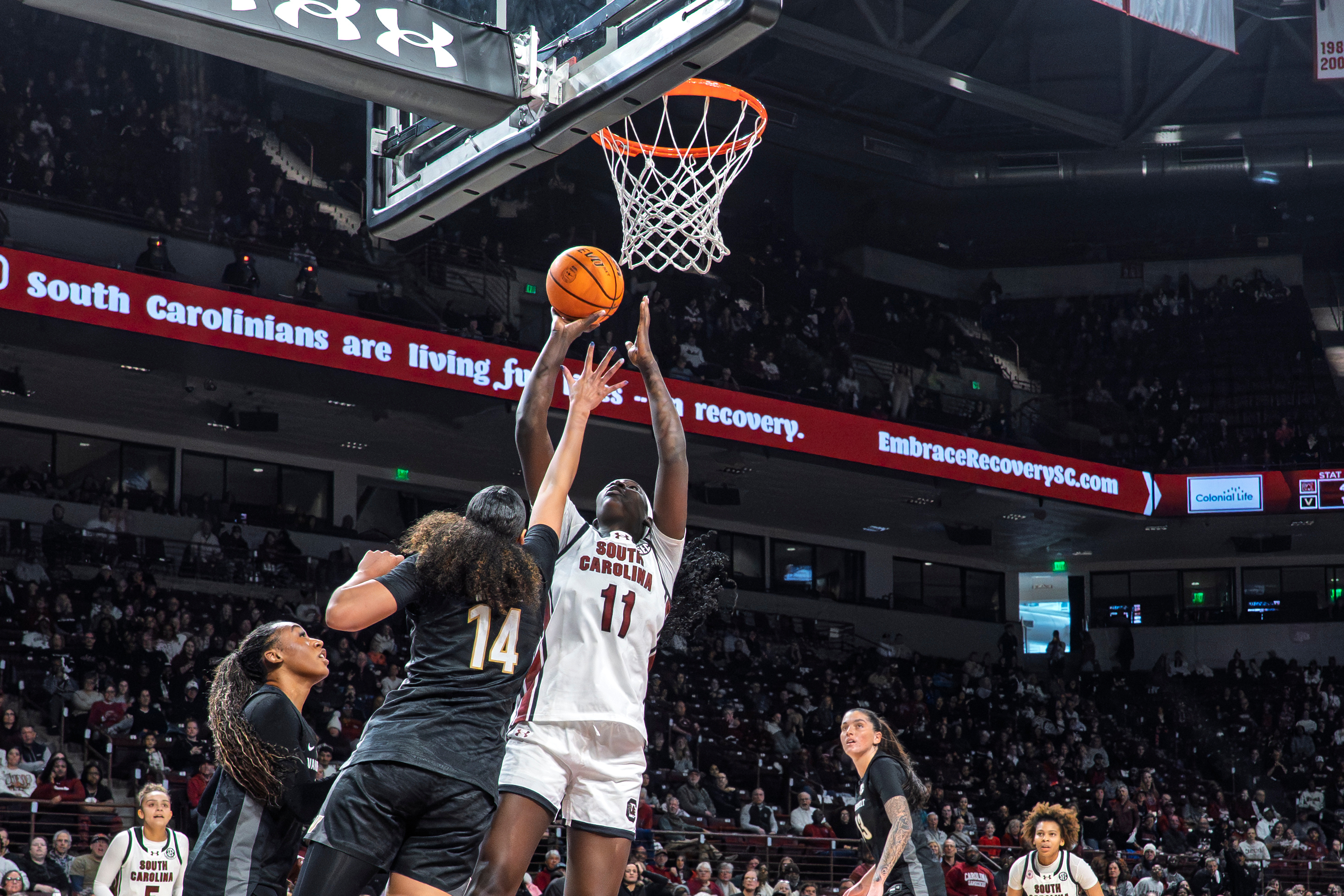 South Carolina center Madina Okot (11) shoots the ball over Vanderbilt forward Aiyana Mitchell (14) during the first half of an NCAA college basketball game Sunday, Jan. 25, 2026, in Columbia, S.C. 