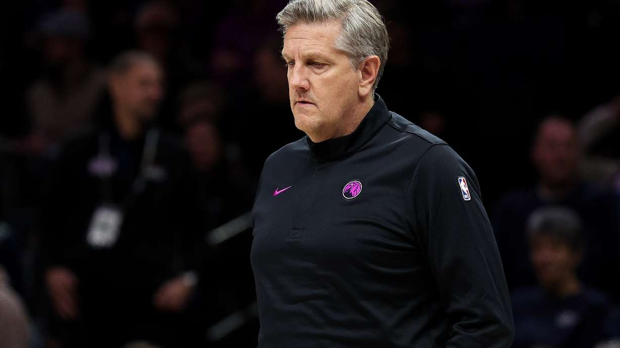 Minnesota Timberwolves head coach Chris Finch looks on during the first half of an NBA basketball game against the Golden State Warriors, Sunday, Jan. 25, 2026, in Minneapolis.