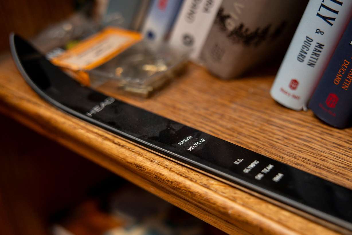 A replica miniature ski sits on a bookshelf at Marvin Melville’s home in Cottonwood Heights on Dec. 15, 2025.