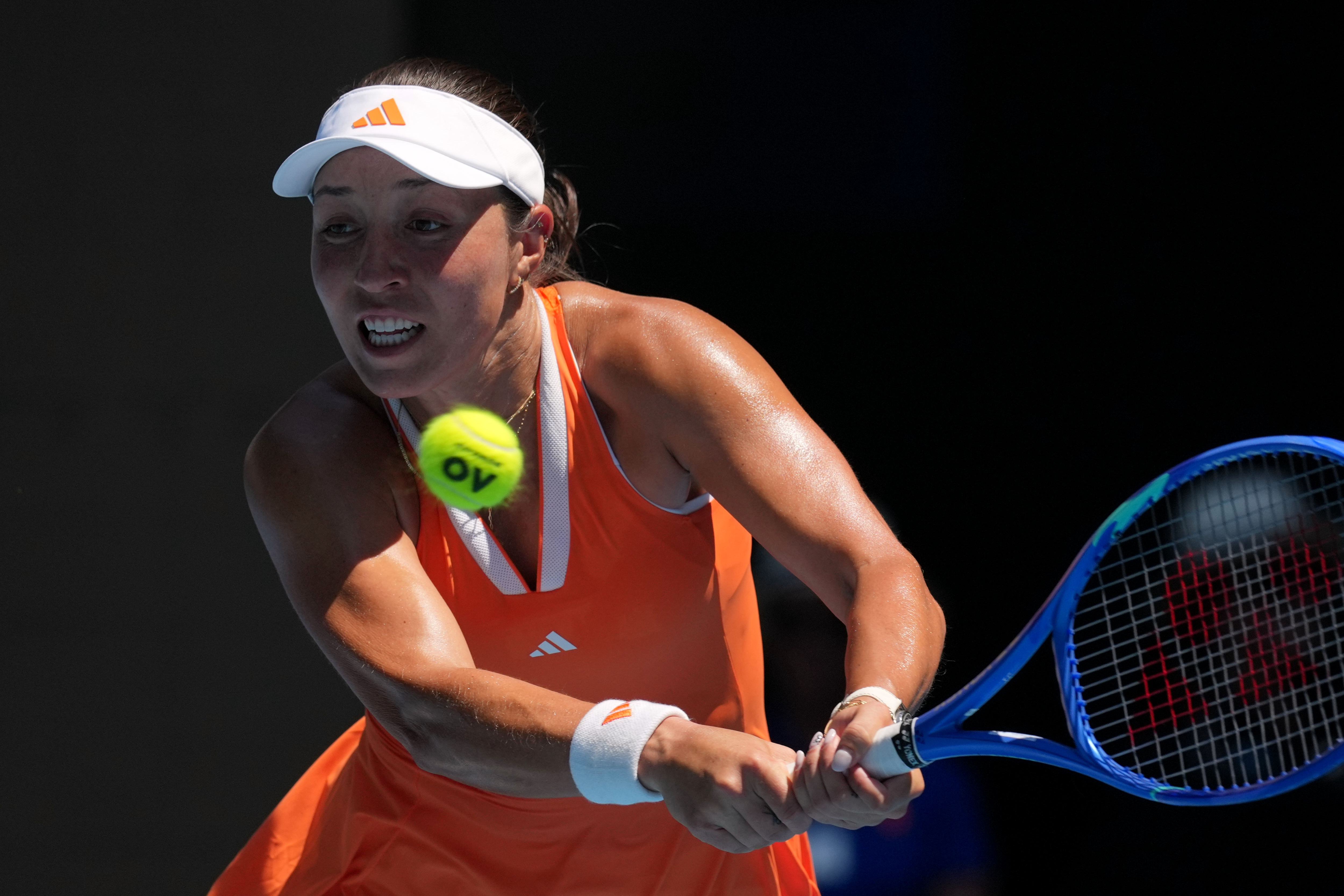 Jessica Pegula of the U.S. plays a backhand return to her compatriot Madison Keys during their fourth round match at the Australian Open tennis championship in Melbourne, Australia, Monday, Jan. 26, 2026. 