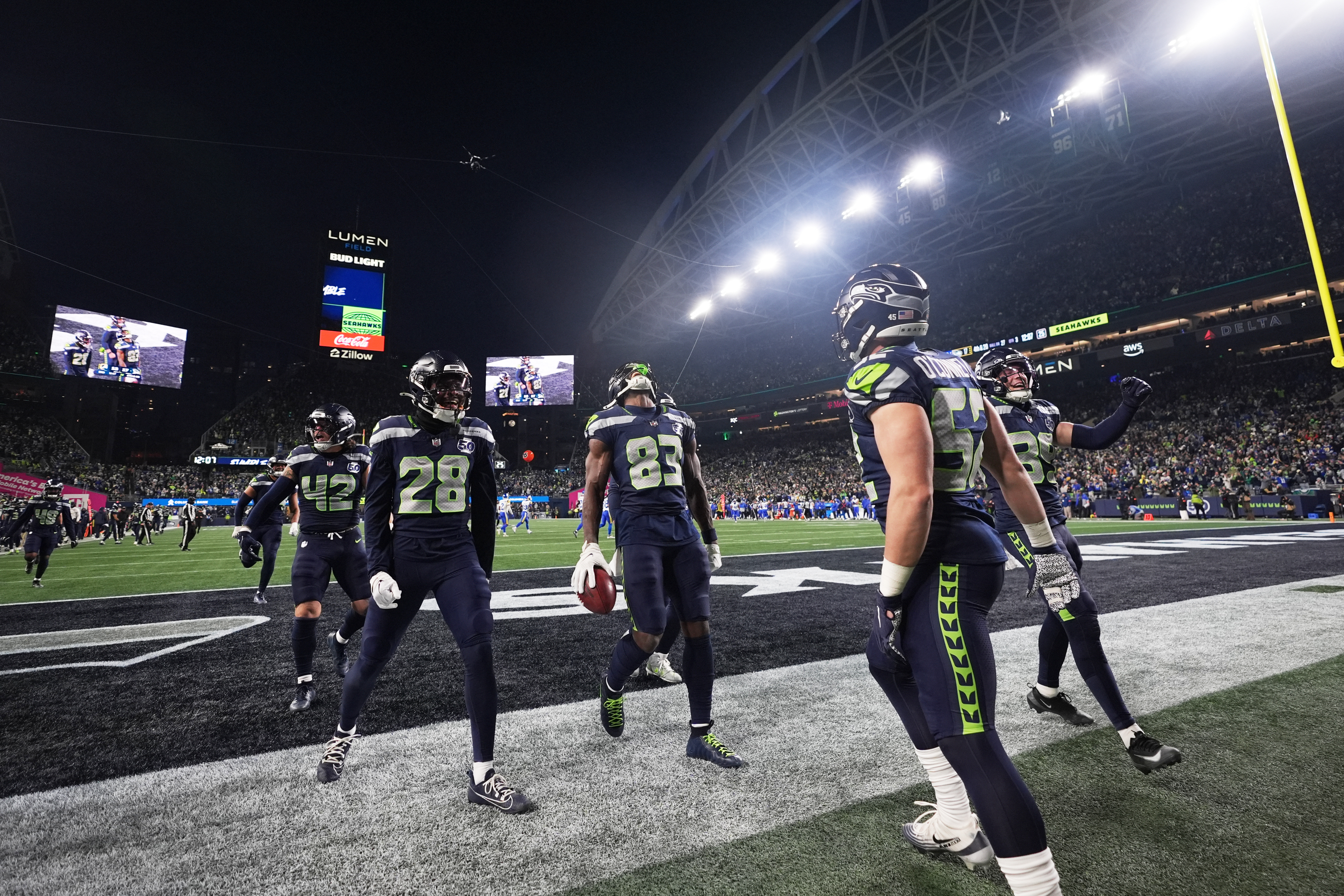 Seattle Seahawks' Dareke Young (83) celebrates after recovering a fumble by Los Angeles Rams wide receiver Xavier Smith during a punt return during the second half of the NFC Championship NFL football game Sunday, Jan. 25, 2026, in Seattle. 