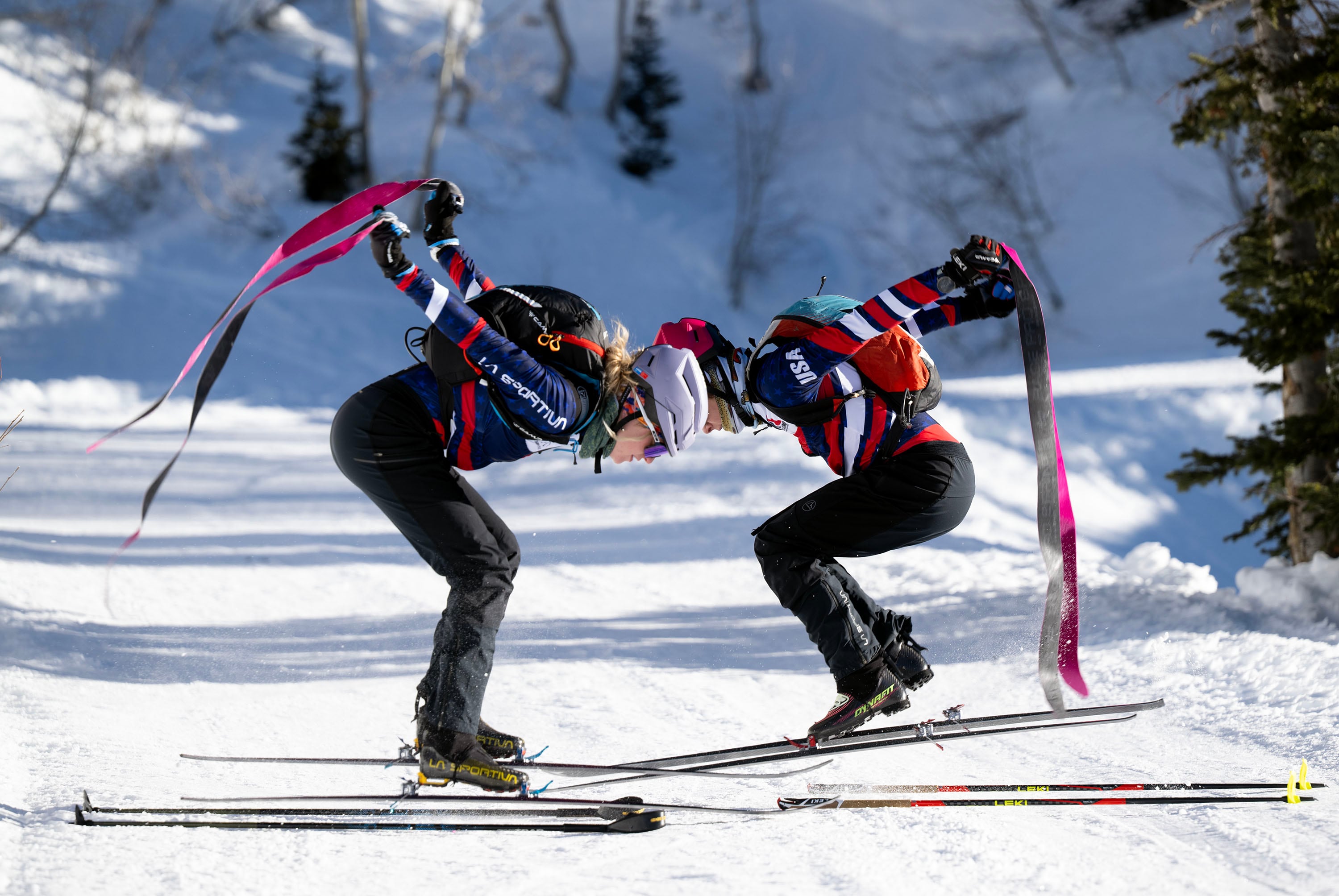 Skimo athletes McCall Birkinshaw and Landon Jakob perform a double rip, jumping and ripping the skins from under their skis, as they demonstrate the relatively new sport during a short workout in Alta on Tuesday.