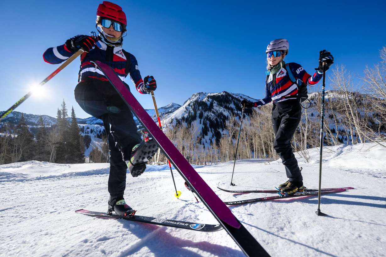 Skimo athlete Landon Jakob shows one of the skins, which are strips of fabric attached to ski bases to grip snow for climbing, as he and fellow teammate McCall Birkinshaw demonstrate the relatively new sport during a short workout in Alta on Tuesday.