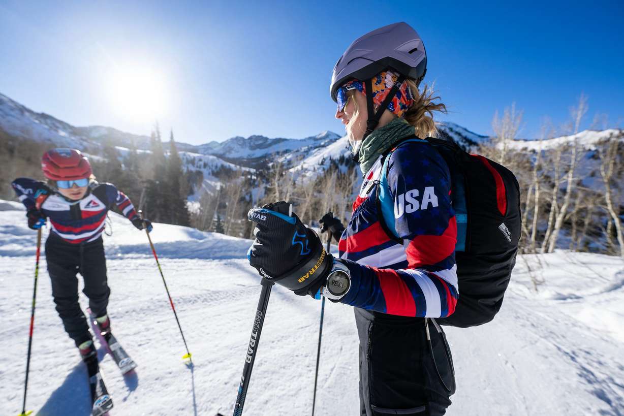 Skimo athletes Landon Jakob and McCall Birkinshaw talk between reps as they demonstrate the relatively new sport during a short workout in Alta on Tuesday.