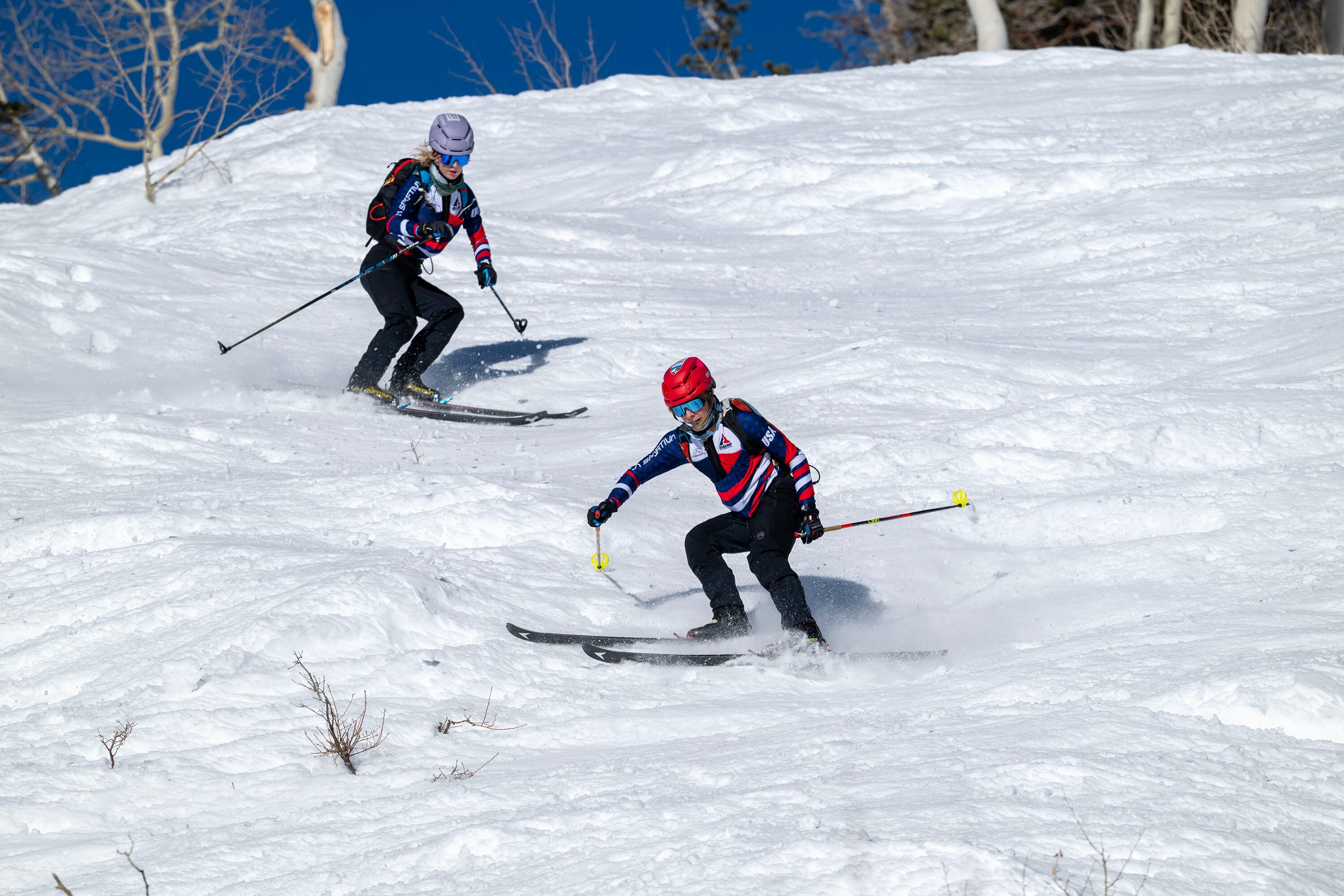 Skimo athletes McCall Birkinshaw and Landon Jakob descend as they demonstrate the relatively new sport during a short workout in Alta on Tuesday.