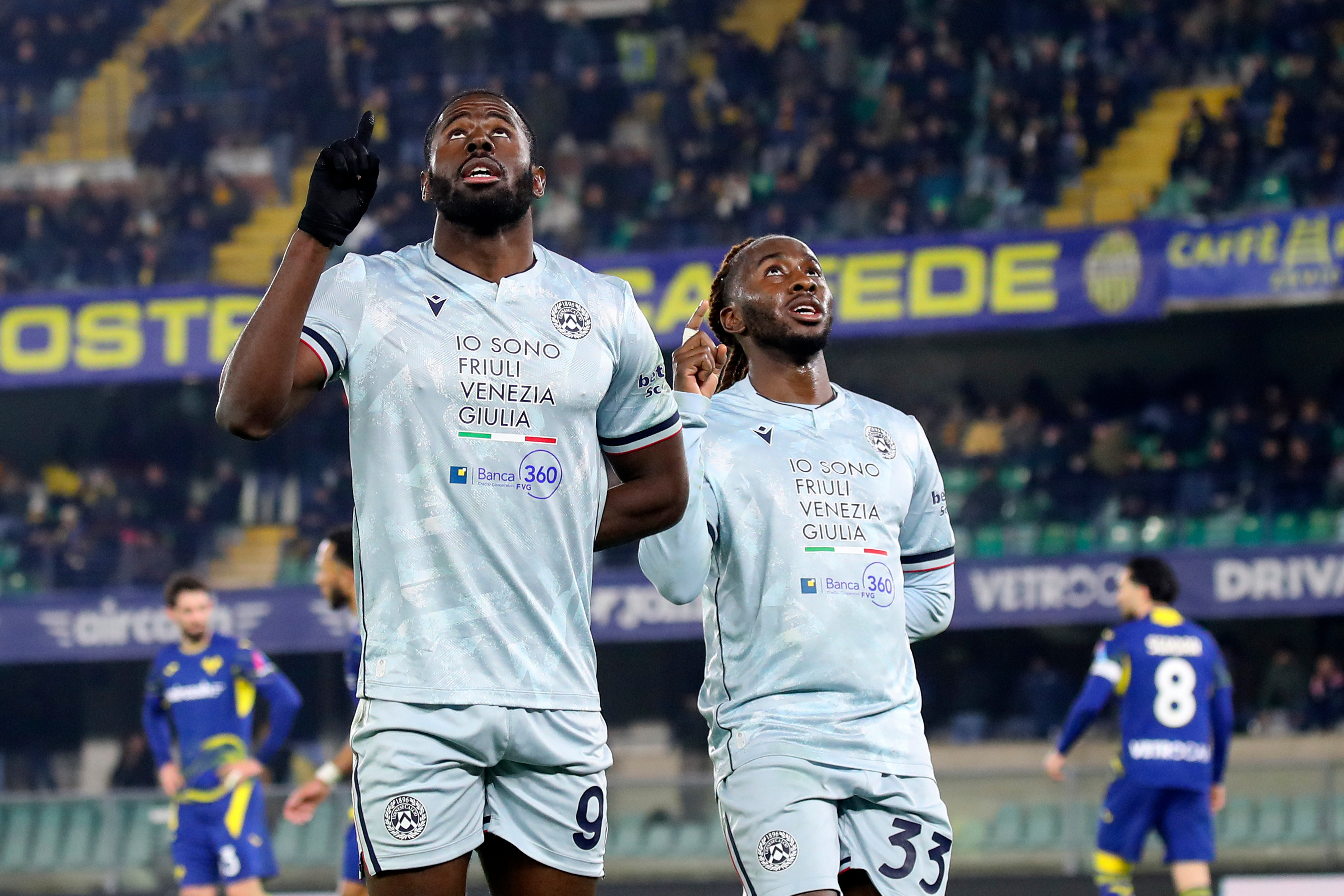 Udinese's Keinan Davis, left, celebrates after scoring their third goal during the Serie A soccer match between Hellas Verona and Udinese in Verona, Italy, Monday Jan. 26, 2026. 