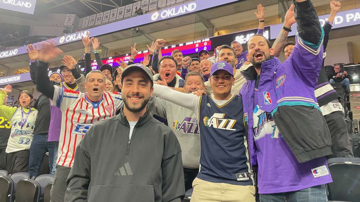 Juan Baracco, center left, and some of the others in the contingent of Utah Jazz fans that came from South America to see the basketball team in action. They're pictured at the Delta Center in Salt Lake City before the Jazz game on Saturday.