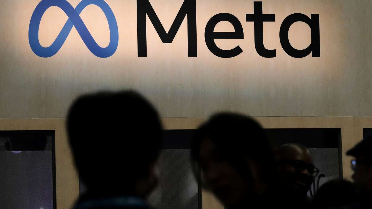 Attendees visit the Meta booth at the Game Developers Conference 2023 in San Francisco on March 22, 2023.