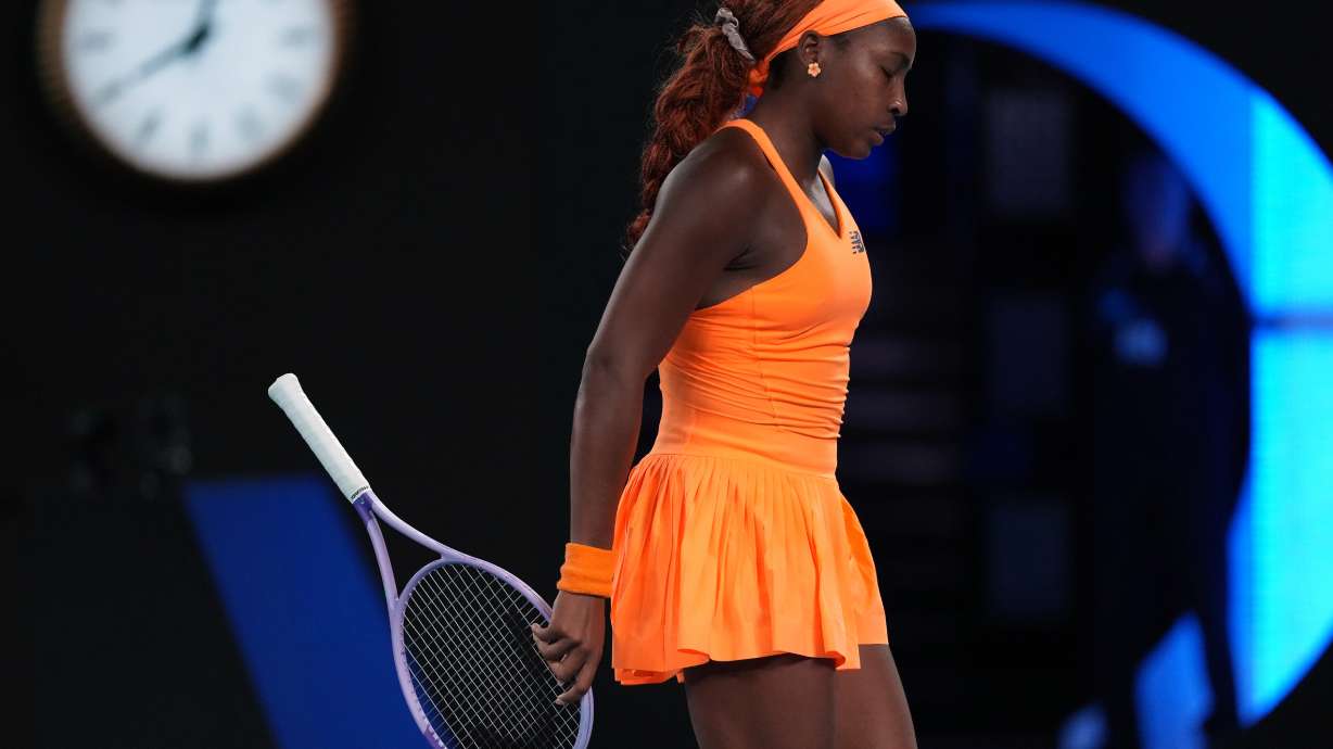 Coco Gauff of the U.S. reacts during her quarterfinal match against Elina Svitolina of Ukraine during their quarterfinal match at the Australian Open tennis championship in Melbourne, Australia, Tuesday, Jan. 27, 2026.