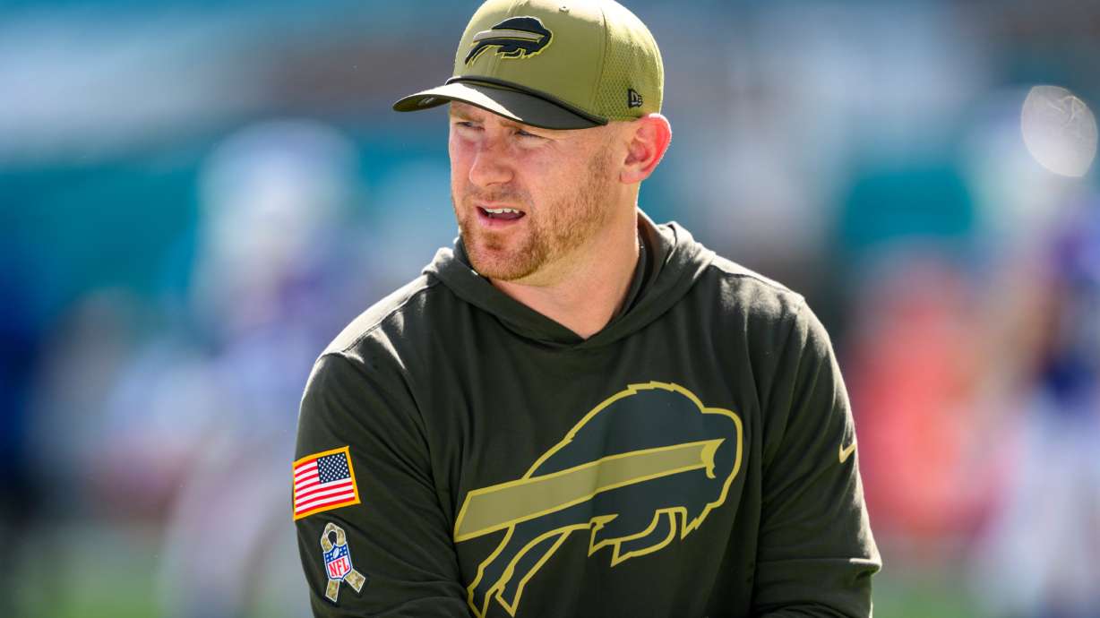 FILE - Buffalo Bills offensive coordinator Joe Brady stands on the field before an NFL football game against the Miami Dolphins, Nov. 9, 2025, in Miami Gardens, Fla.