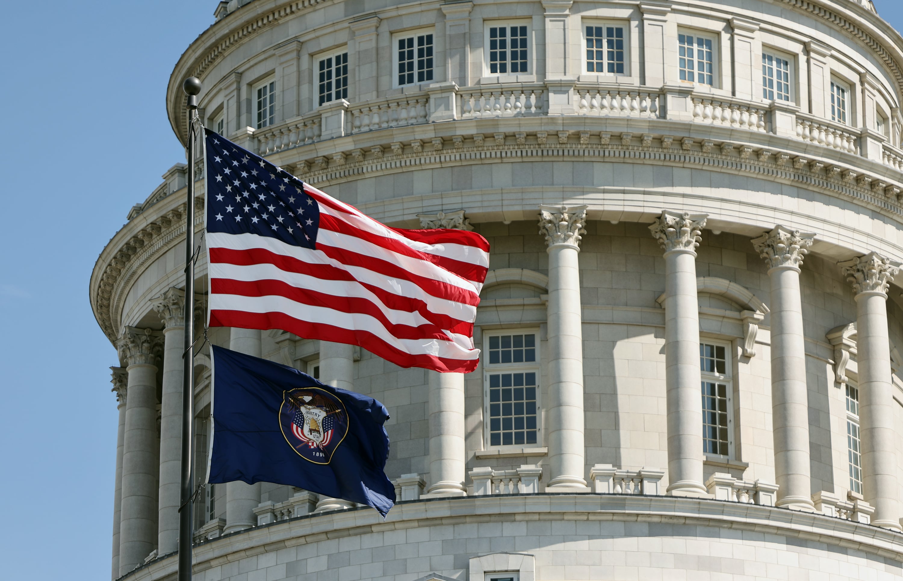 The American flag and the old state flag fly at the Capitol in Salt Lake City on May 16, 2023. The Legislature passed 18 bills with federalism principles last session.