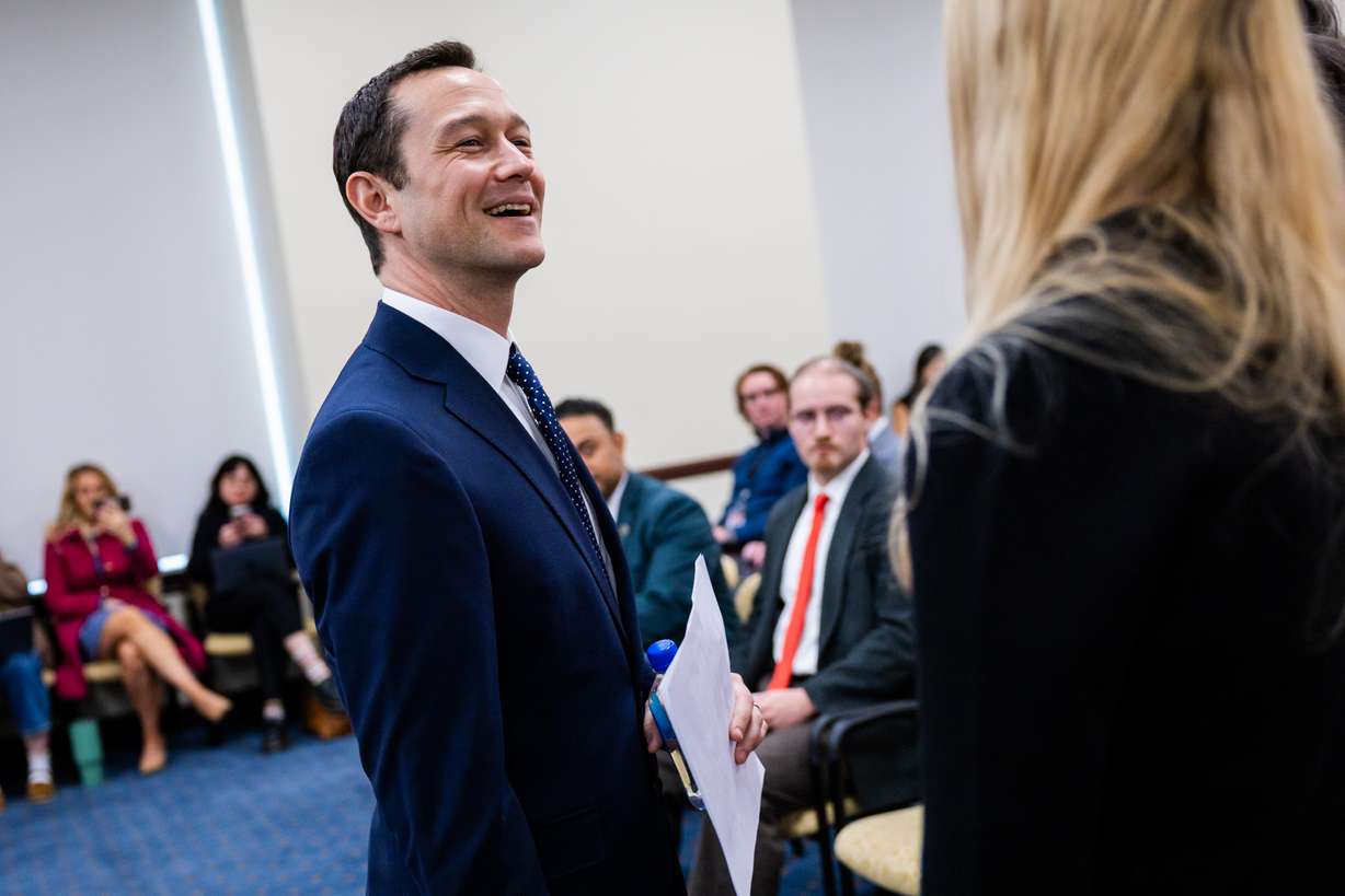 Actor Joseph Gordon-Levitt, left, speaks at the Capitol in Salt Lake City on Tuesday.