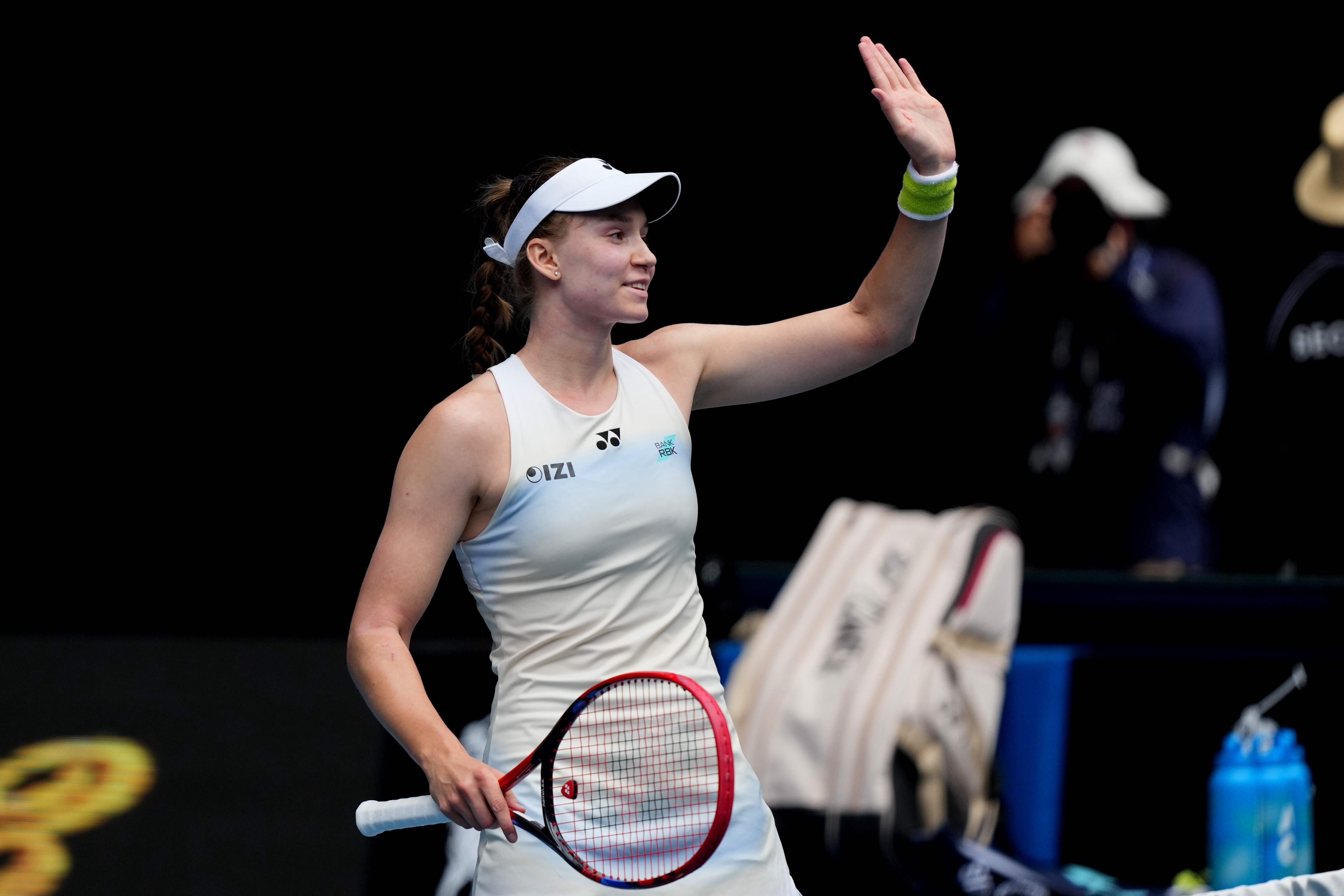 Elena Rybakina of Kazakhstan waves after defeating Iga Swiatek of Poland in their quarterfinal match at the Australian Open tennis championship in Melbourne, Australia, Wednesday, Jan. 28, 2026. 