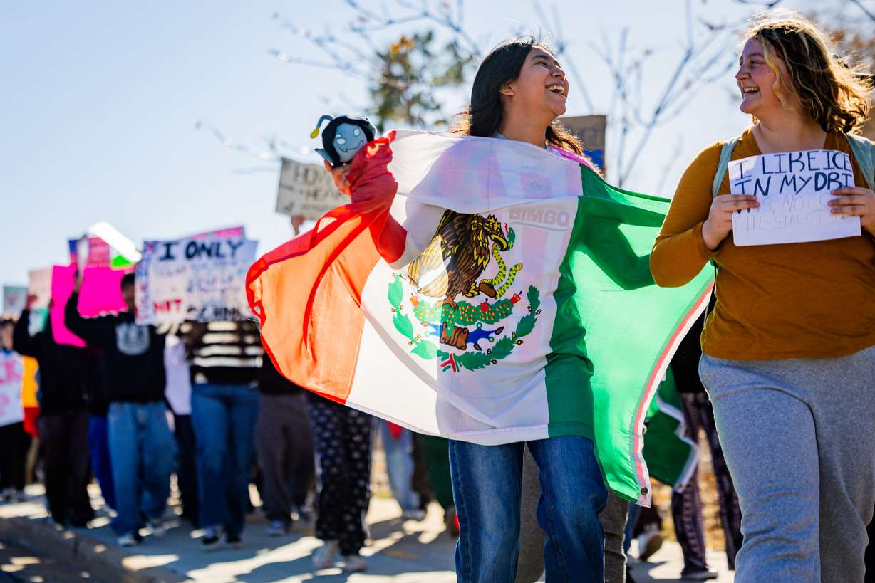 Desiree Moreno, 14, left, and fellow students from Kearns High School walkout to protest ICE at Kearns High School in Kearns on Tuesday, Jan. 27, 2026.