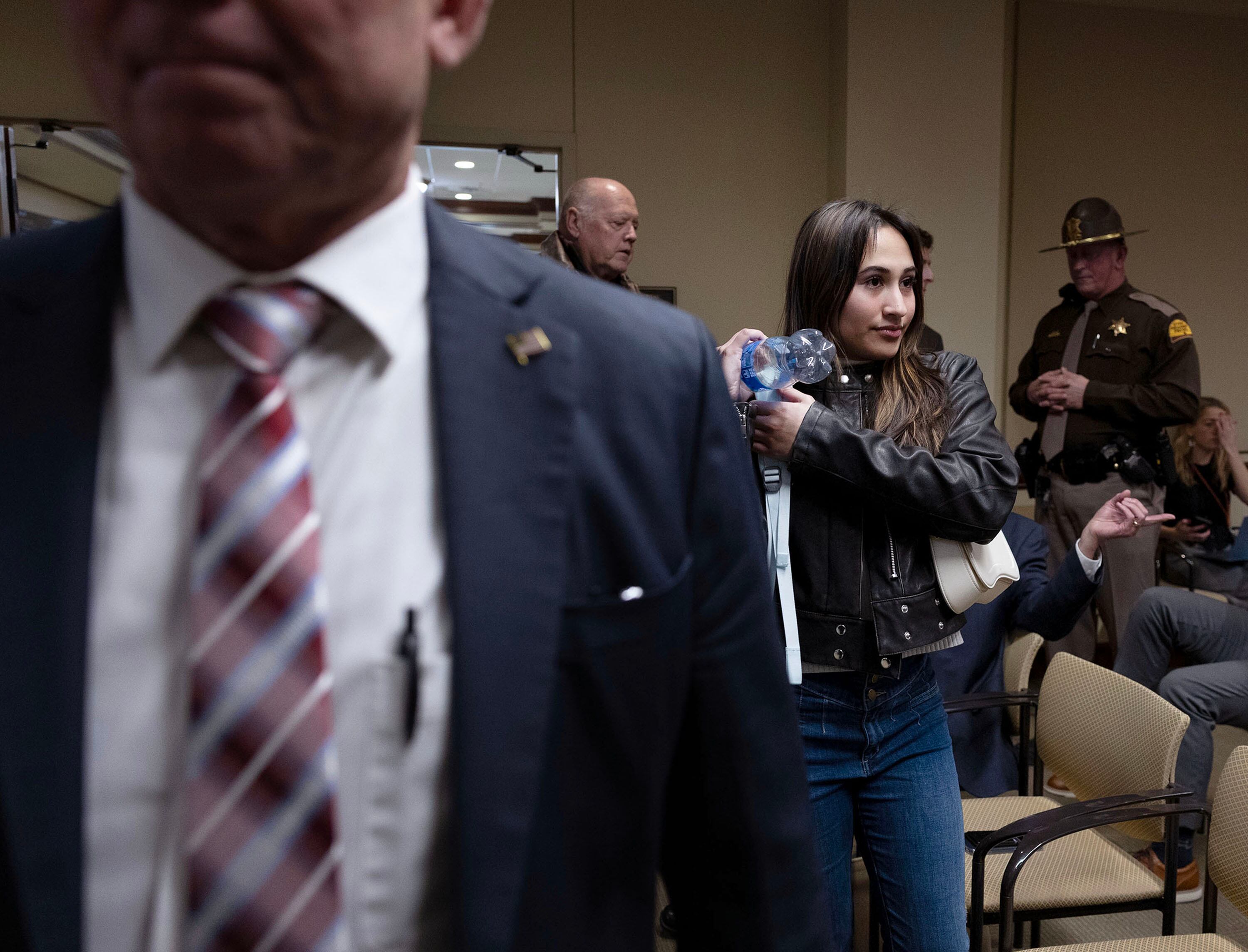 Chloe Cole enters a House Health and Human Services Committee meeting at the Capitol in Salt Lake City on Tuesday.