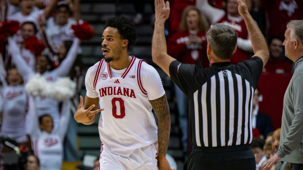 Indiana guard Jasai Miles (0) reacts after scoring during the first half of an NCAA college basketball game against Purdue, Tuesday, Jan. 27, 2026, in Bloomington, Ind.