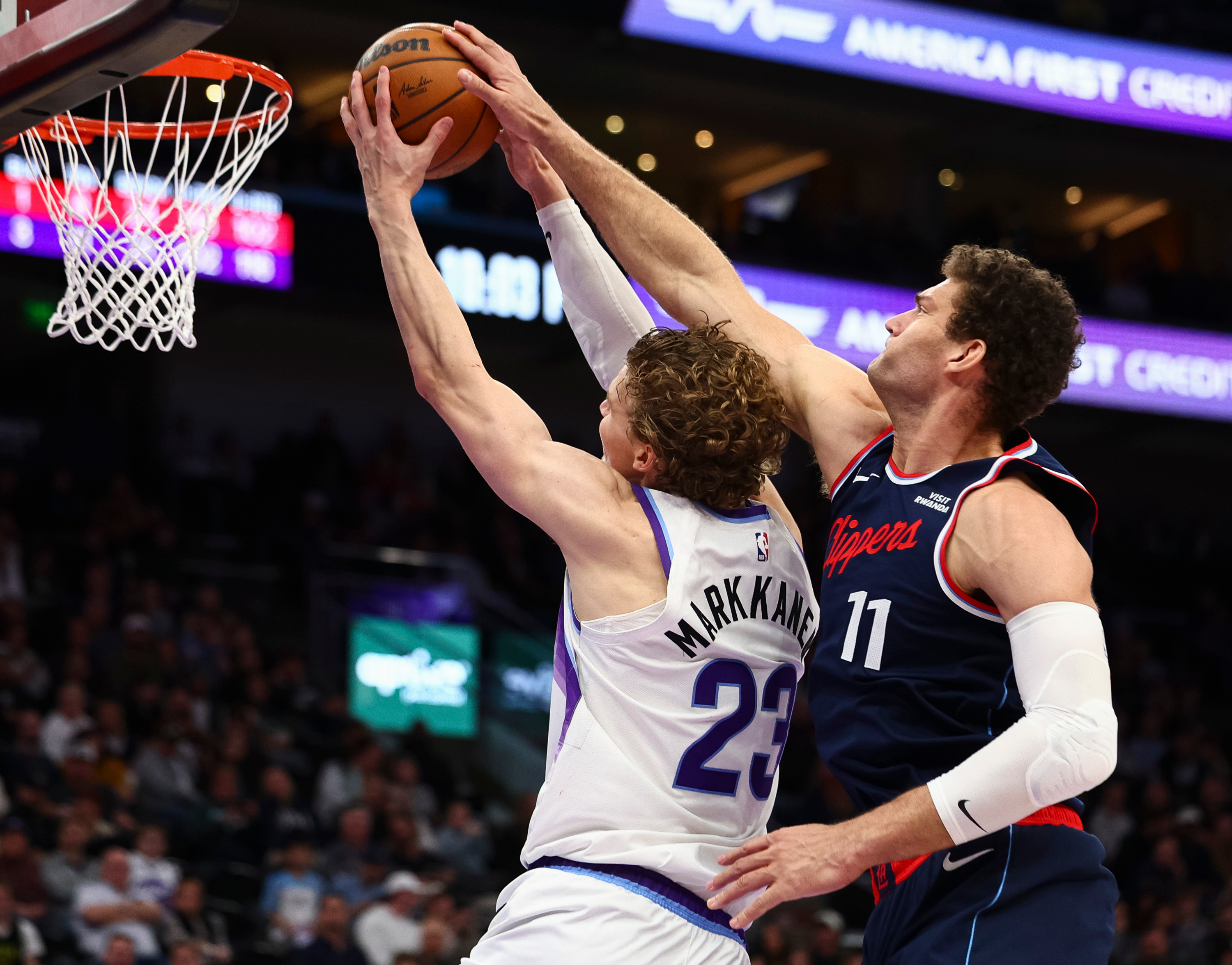 LA Clippers center Brook Lopez (11) blocks a lay up attempt by Utah Jazz forward Lauri Markkanen (23) during the second half of an NBA game at the Delta Center in Salt Lake City on Tuesday, Jan. 27, 2026.