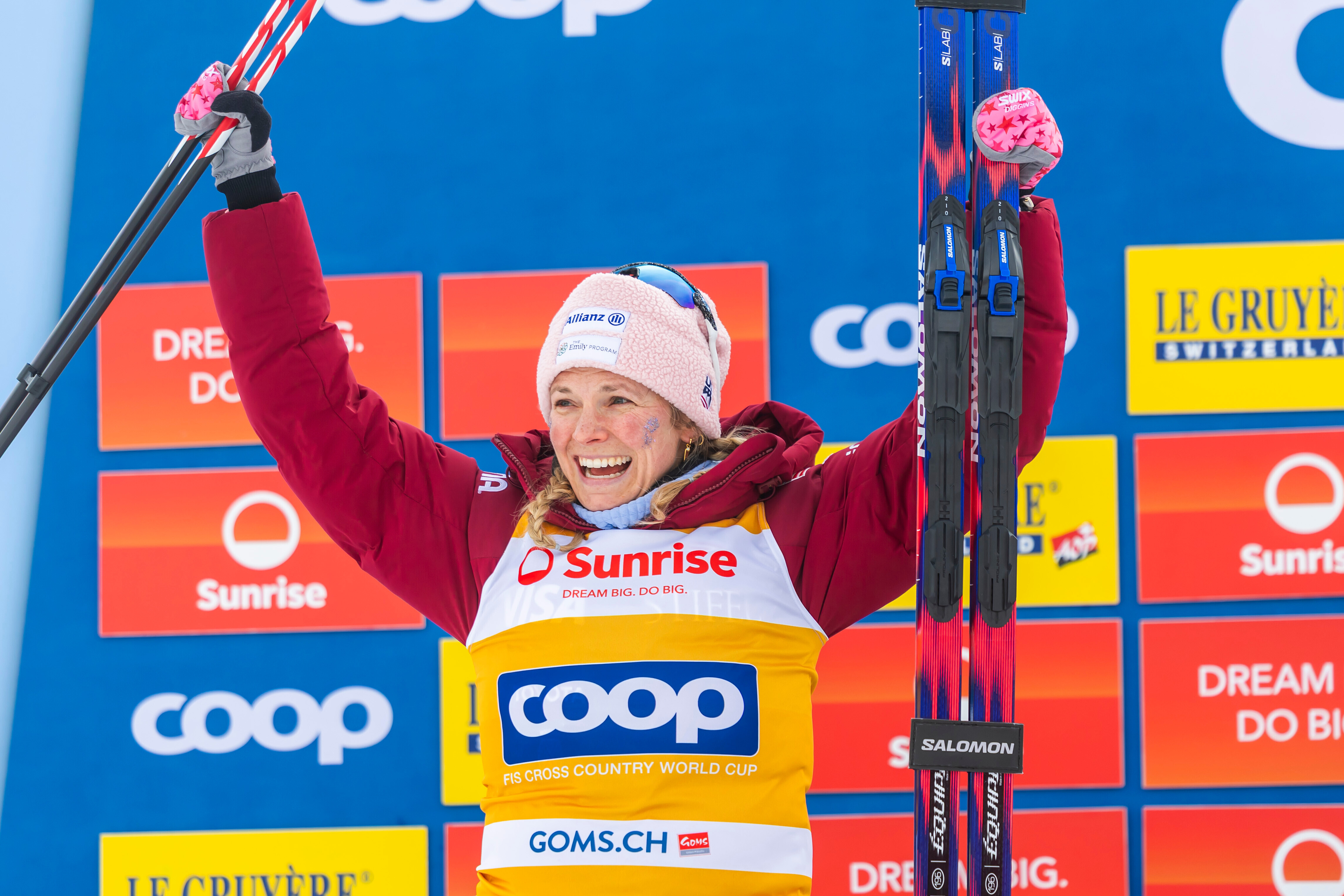 Second placed Jessie Diggins of United States celebrates on the podium after the women's 20km mass start classic skiing race, at the FIS Cross-Country World Cup at the Nordic Center Goms, in Geschinen, Switzerland, Sunday, Jan. 25, 2026. 