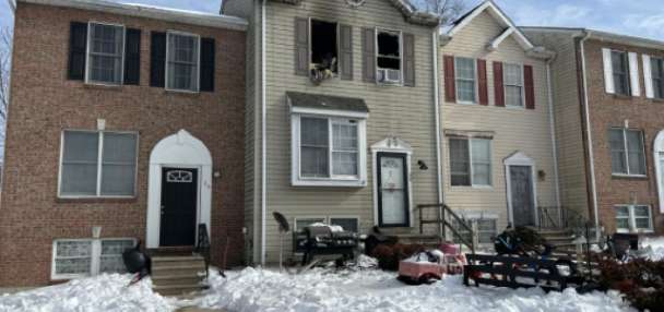 Mother drops baby from window in fire