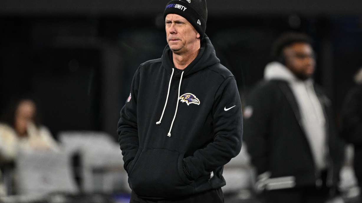 FILE - Baltimore Ravens offensive coordinator Todd Monken looks on during pre-game warm-ups before an NFL football game against the New England Patriots, Sunday, Dec. 21, 2025, in Baltimore.