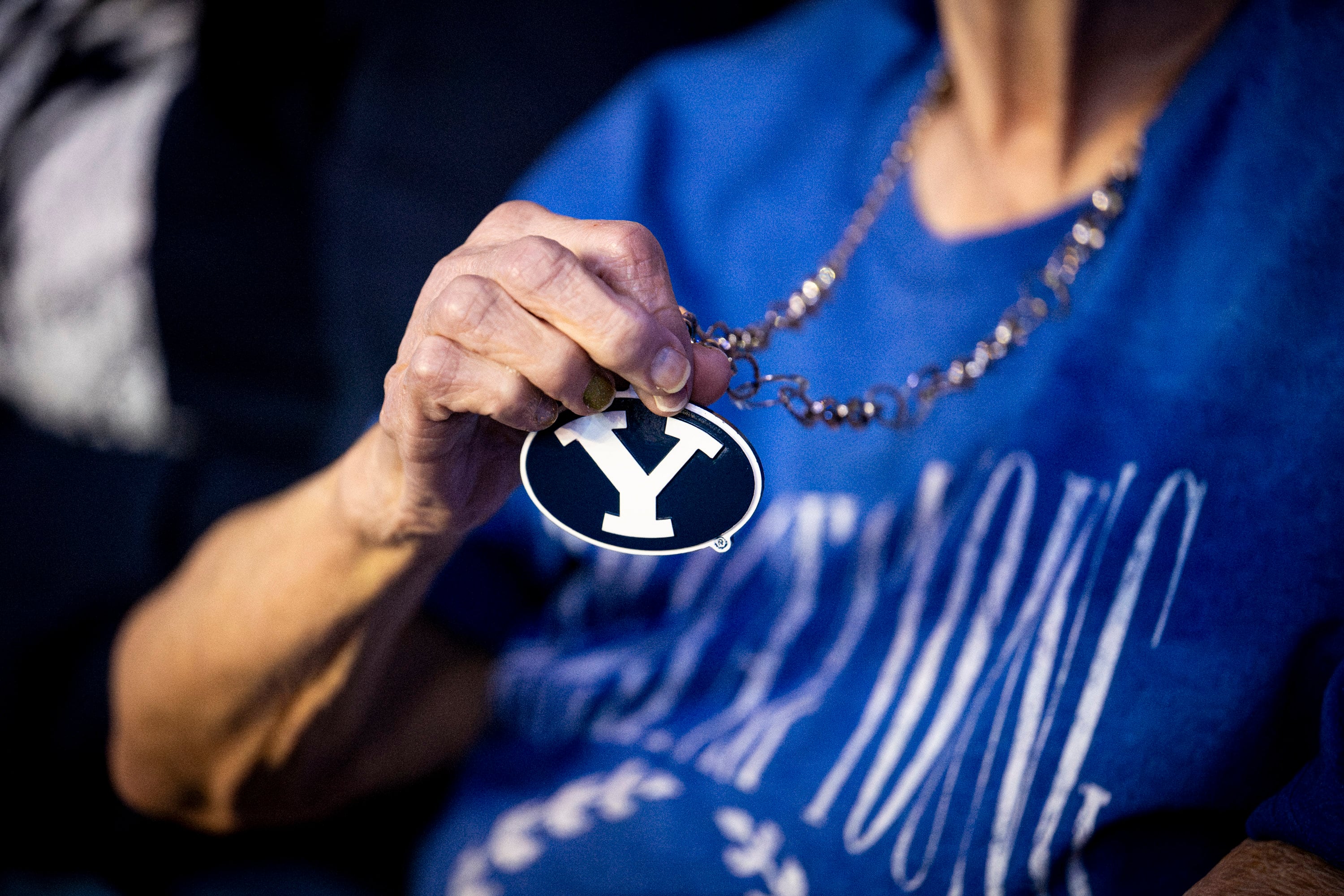 Penny Spresser, 86, poses with a BYU necklace before an NCAA men’s basketball game between BYU and Utah held at the Marriott Center in Provo on Jan. 24.