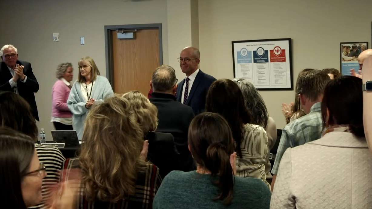 Joe Jensen stands in front of attendees after being appointed the inaugural superintendent of the new Timpanogos School District in Utah County on Wednesday.