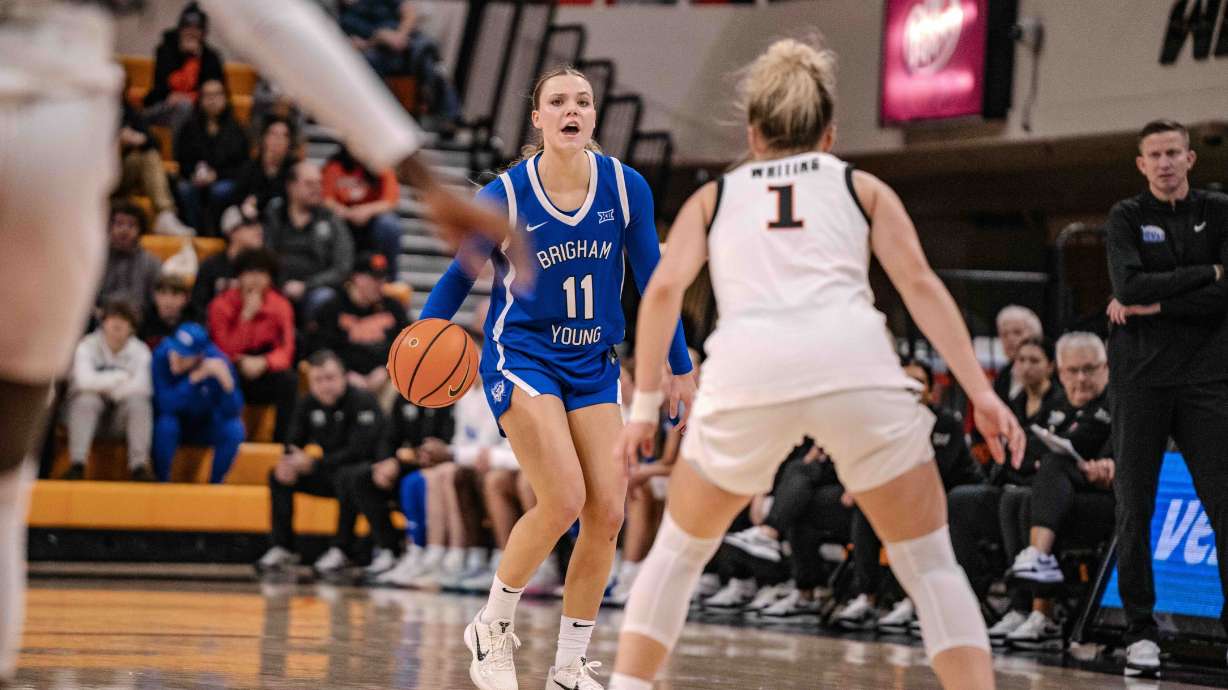 BYU guard Delaney Gibb is guarded by Oklahoma State's Amari Whiting during a Big 12 women's basketball game, Wednesday, Jan. 28, 2026 at Gallagher-Iba Arena in Stillwater, Oklahoma.