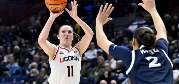 Ziebell leads UConn to 50th consecutive Big East regular-season victory, beating Xavier 97-39
