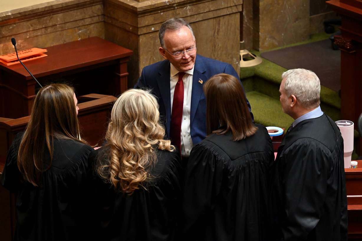 Senate President Stuart Adams, R-Layton, talks with Utah Supreme Court Justices Jill M. Pohlman, Diana Hagen, Paige Petersen and Associate Chief Justice John A. Pearce at the Capitol in Salt Lake City on Jan. 21, 2025. The Utah State Bar expressed concern over court packing on Wednesday.