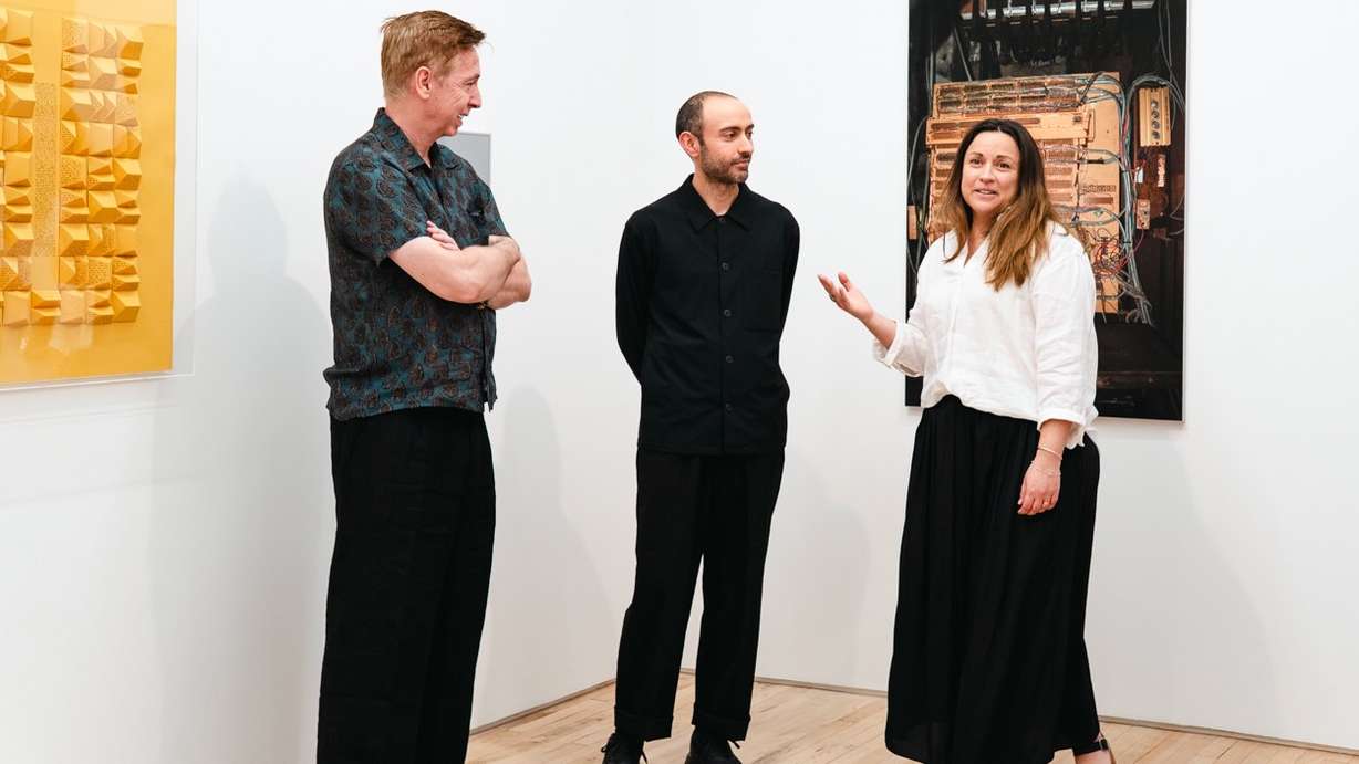 Argentine siblings Gonzalo Silva, center, and Susana Silva, right, will take part in a panel discussion on Friday at the Utah Museum of Contemporary Art on their exhibit, Instrumentos de Silencio. They're photographed in an undated photo at an exhibit in New York City.