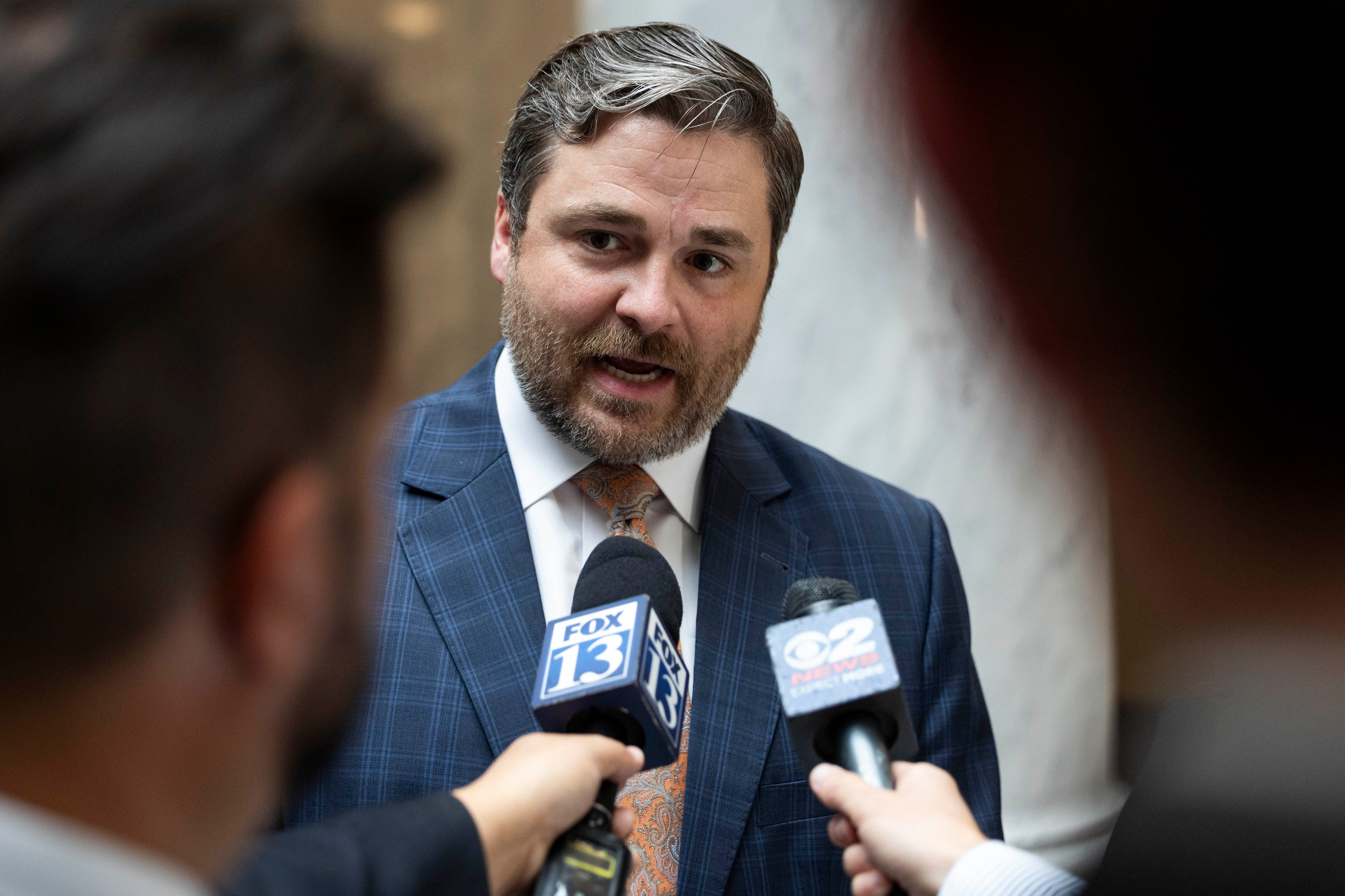 Republican Party Chair Rob Axson speaks with media after filing paperwork to run a referendum to repeal map C and an initiative to ask the Legislature to repeal Proposition 4 at the Capitol in Salt Lake City on Oct. 14, 2025.