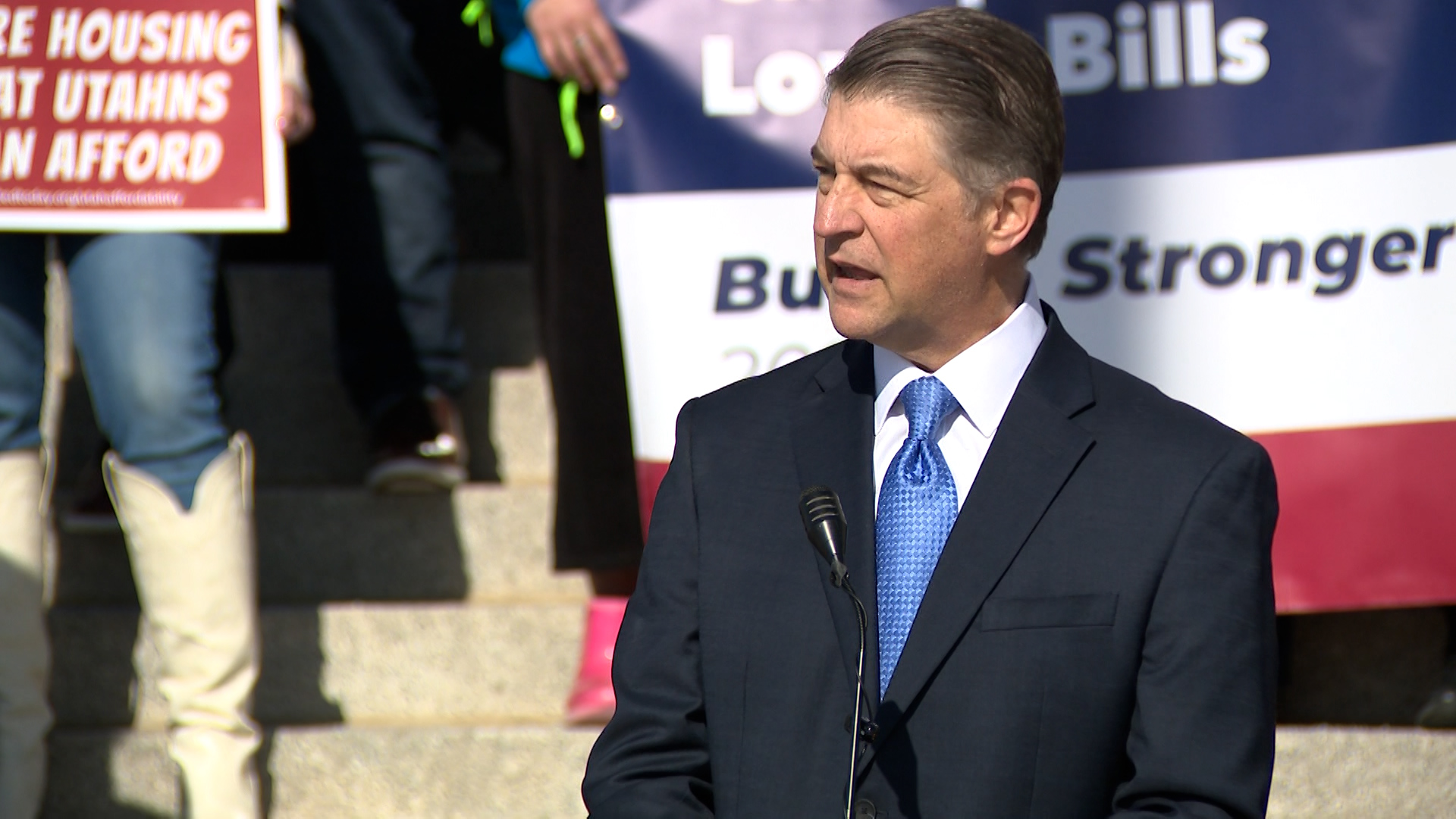The Rev. Dr. Curtis Price of the First Baptist Church of Salt Lake City speaks outside the Utah Capitol on Thursday. Price sought an optimistic tone about the future of the state's cost of living challenges.