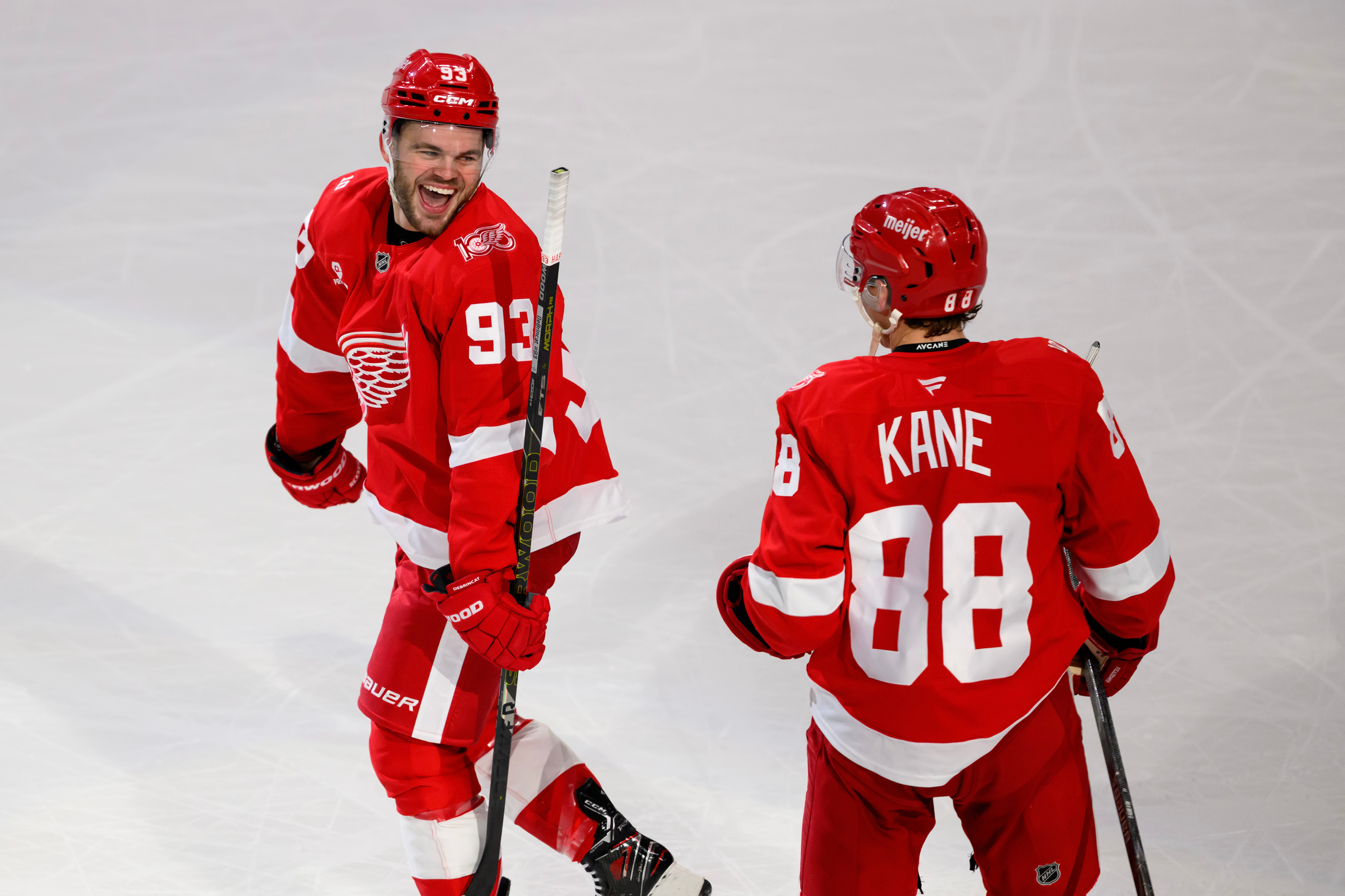 Detroit Red Wings right wing Alex DeBrincat (93) Detroit Red Wings right wing Patrick Kane (88) after scoring the game-winning goal against the Ottawa Senators in overtime of an NHL hockey game, Sunday, Jan. 18, 2026, in Detroit. 